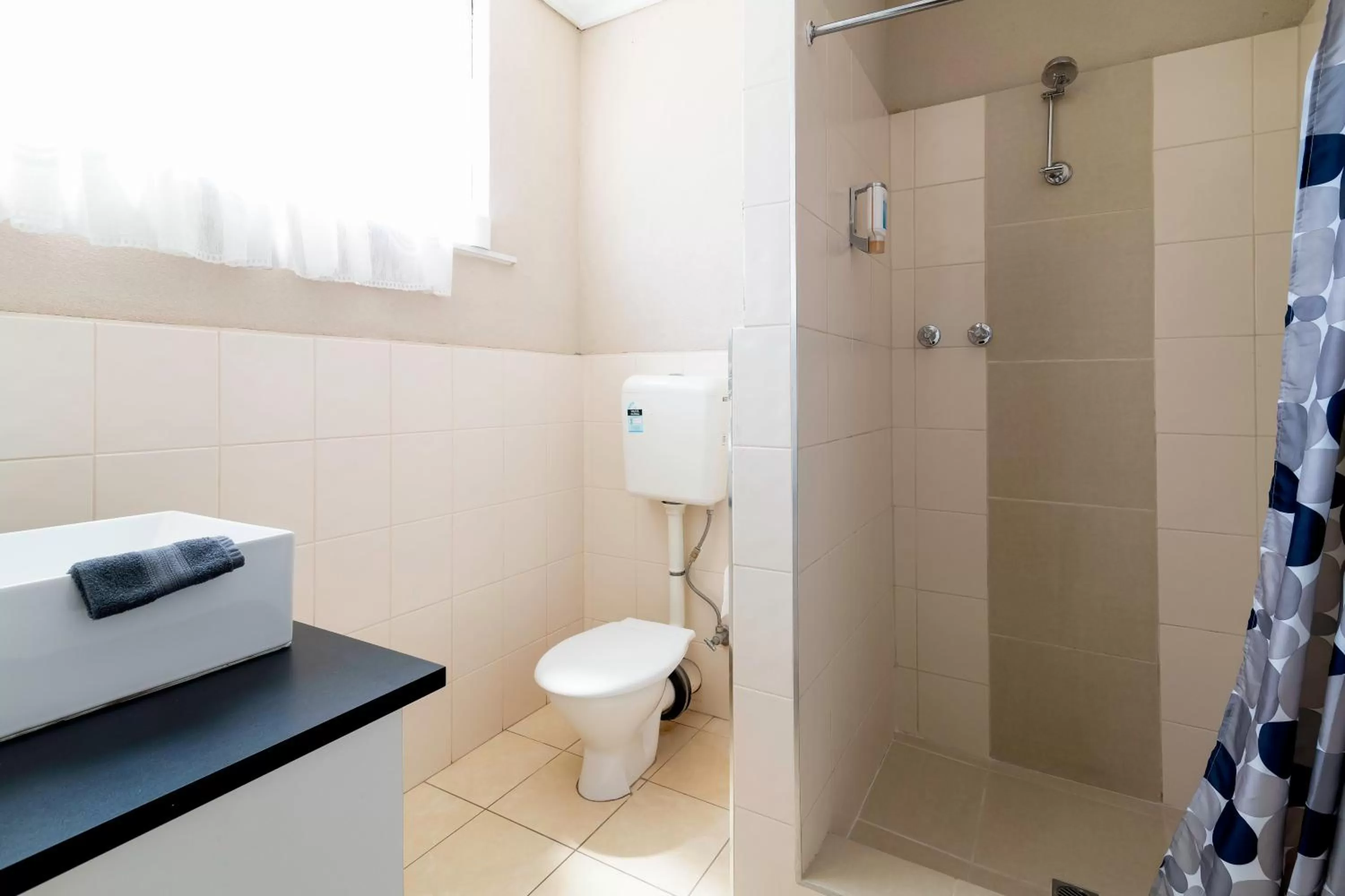 Shower in The Prince Mark Motel