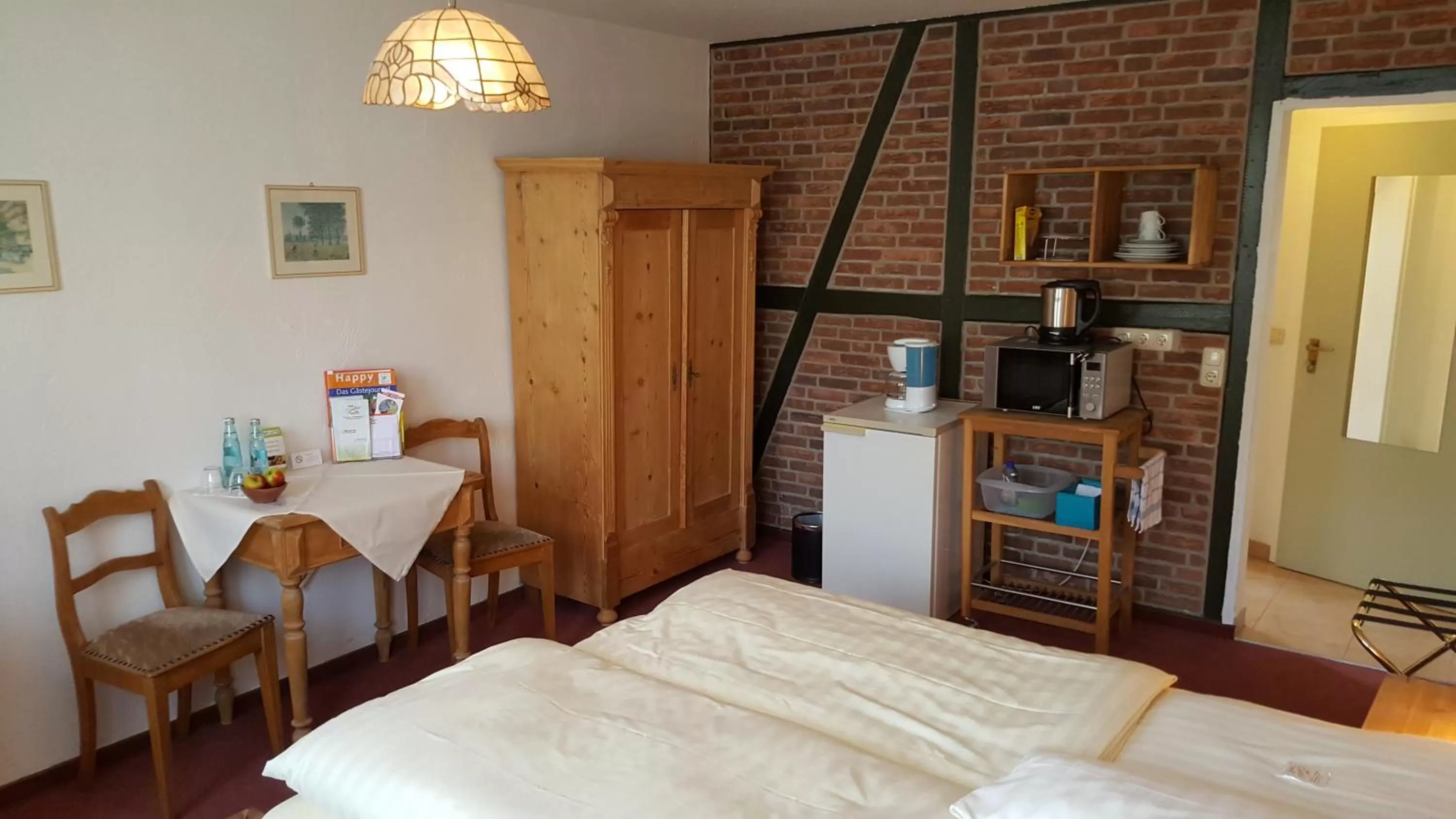 Photo of the whole room, Bed in Hotel Goldflair am Rathaus