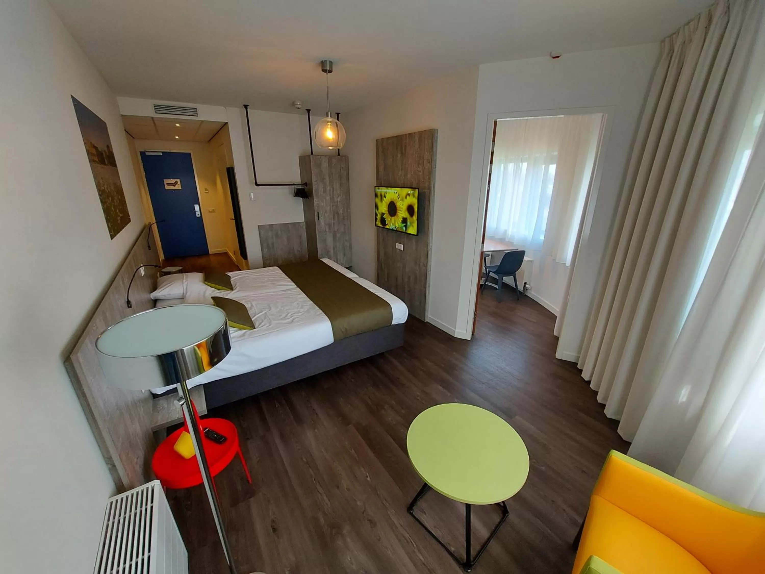 Kitchen or kitchenette, Bed in ibis Styles Almere