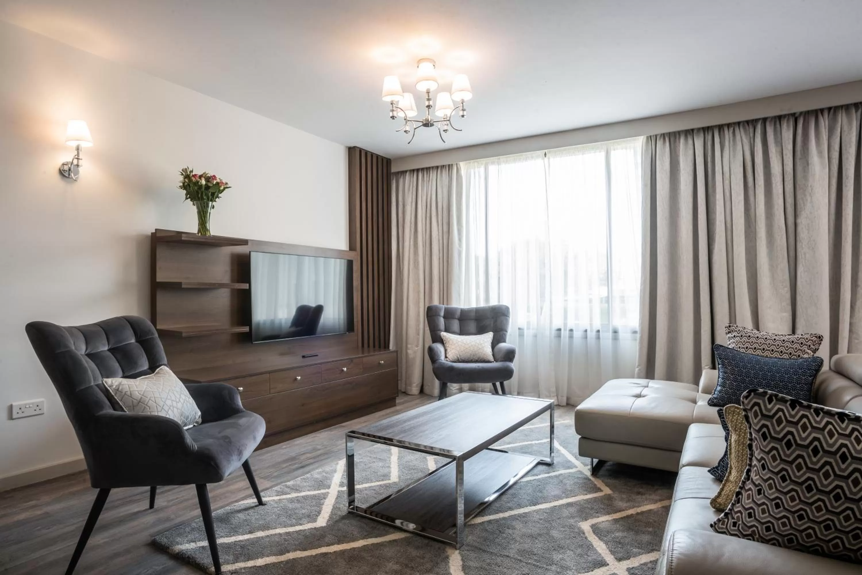 Communal lounge/ TV room in Yaya Hotel & Apartments