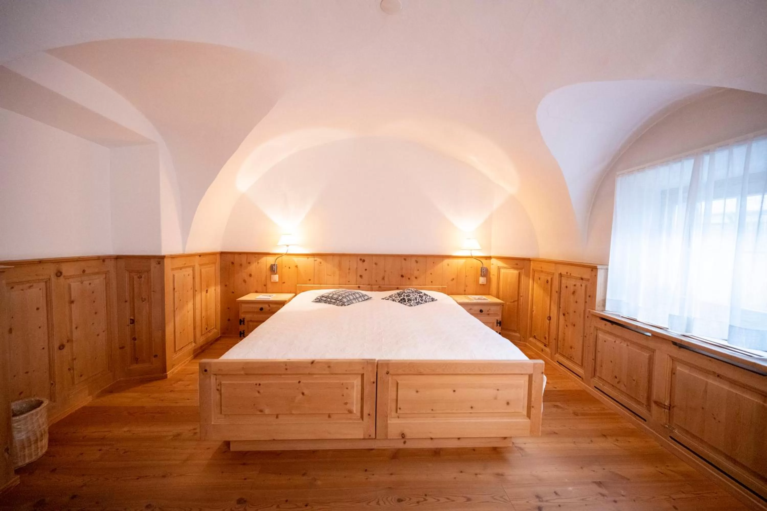 Bed in Hotel Engiadina