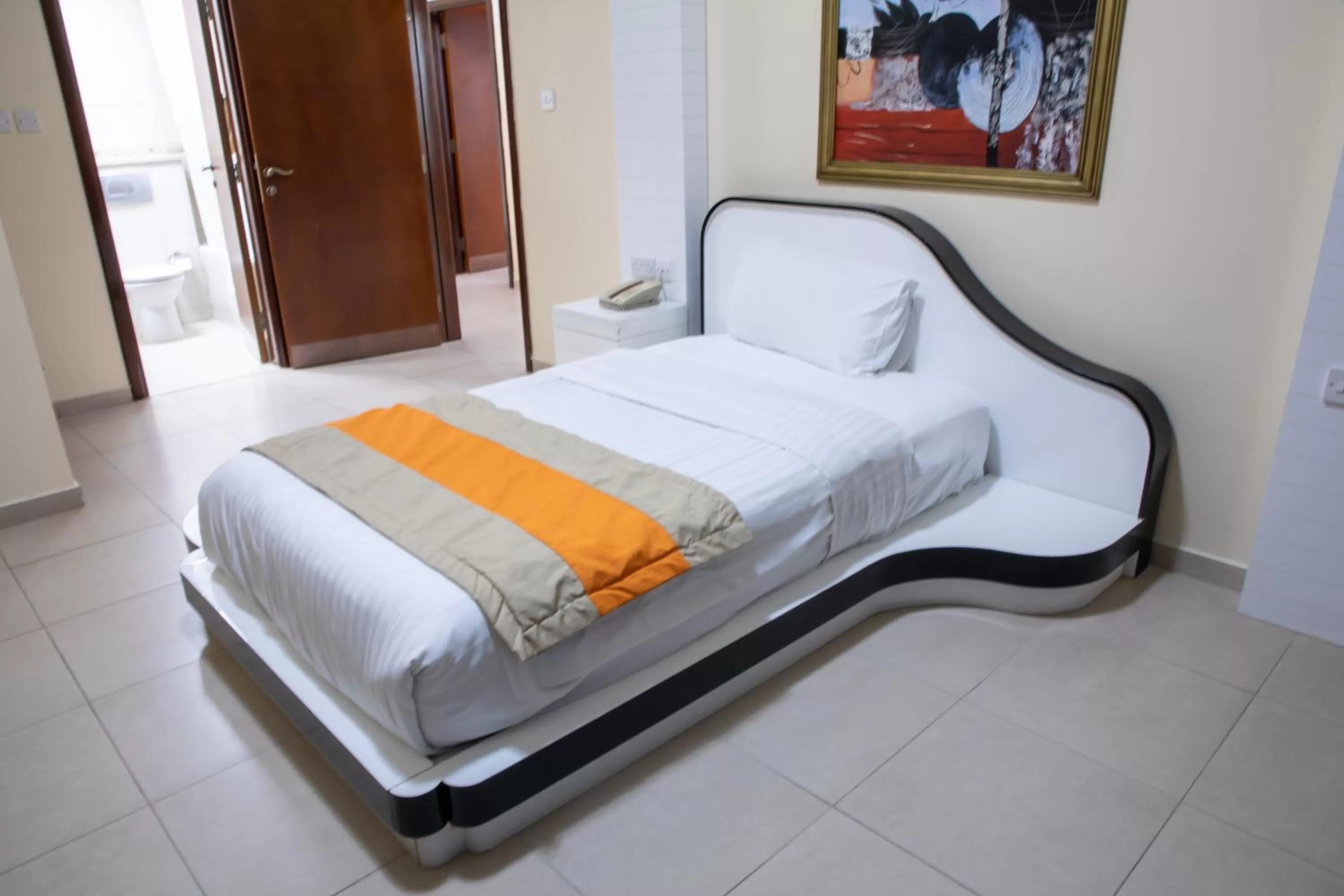 Bed in Wescott Plaza Hotel Apartments LLC Formerly West Zone Plaza Hotel Apts