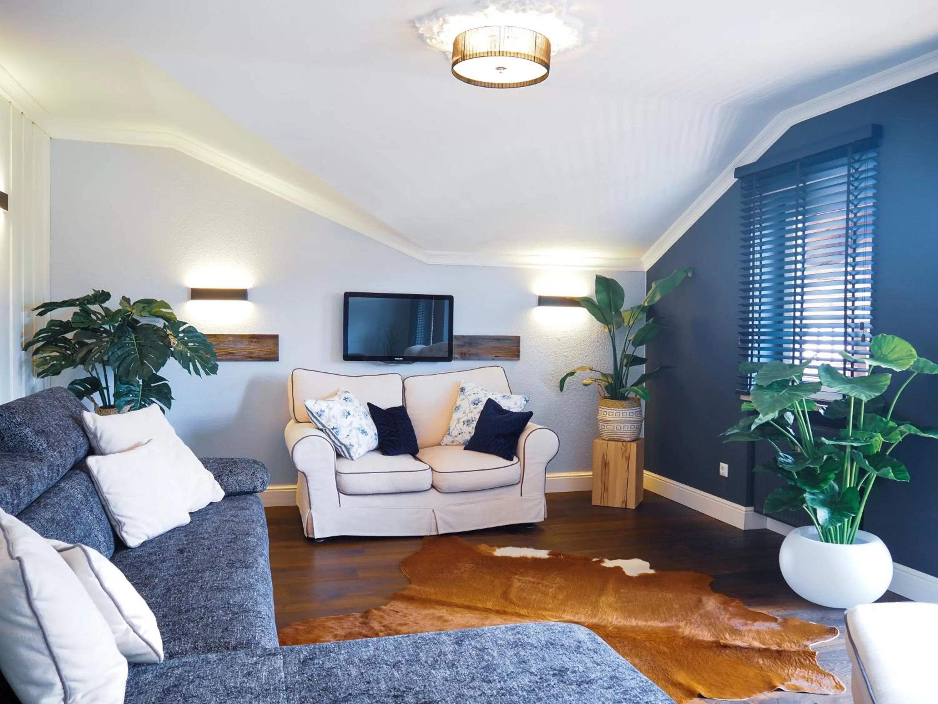 Living room, Seating Area in Sauna & Whirlpool - ALPENLIEBE APARTments