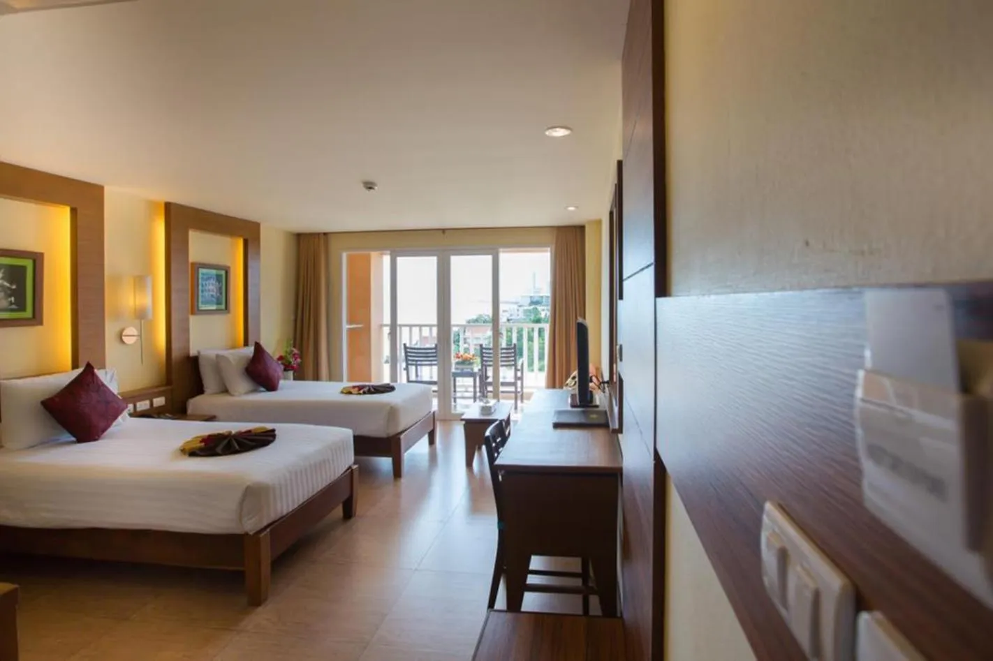 Photo of the whole room, Bed in Saisawan Beach Luxury Hotel