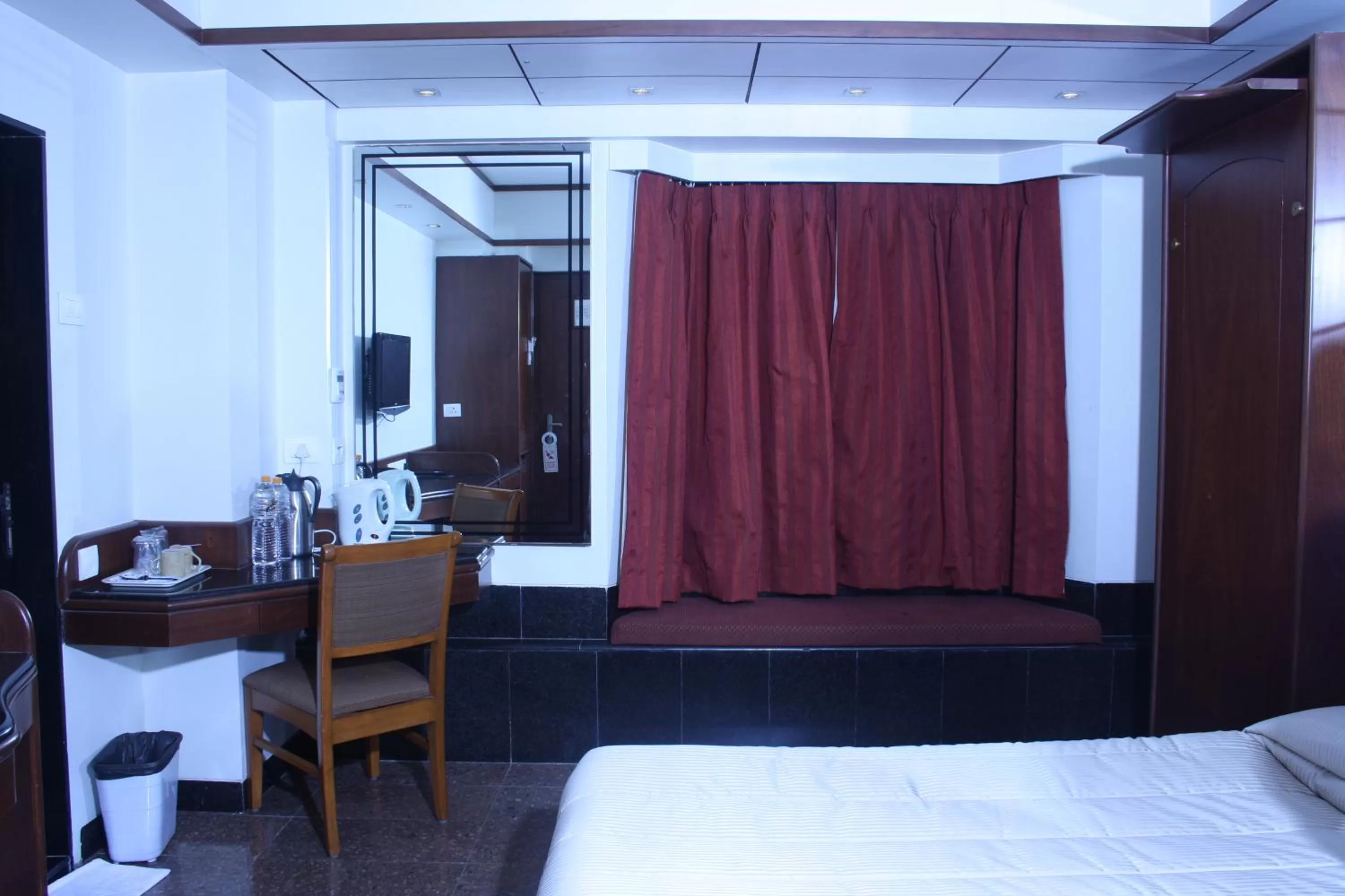 Bed in Hotel Karl Residency