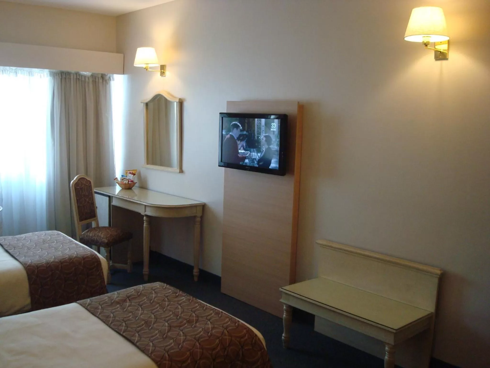 TV and multimedia, TV/Entertainment Center in Centuria Hotel Buenos Aires