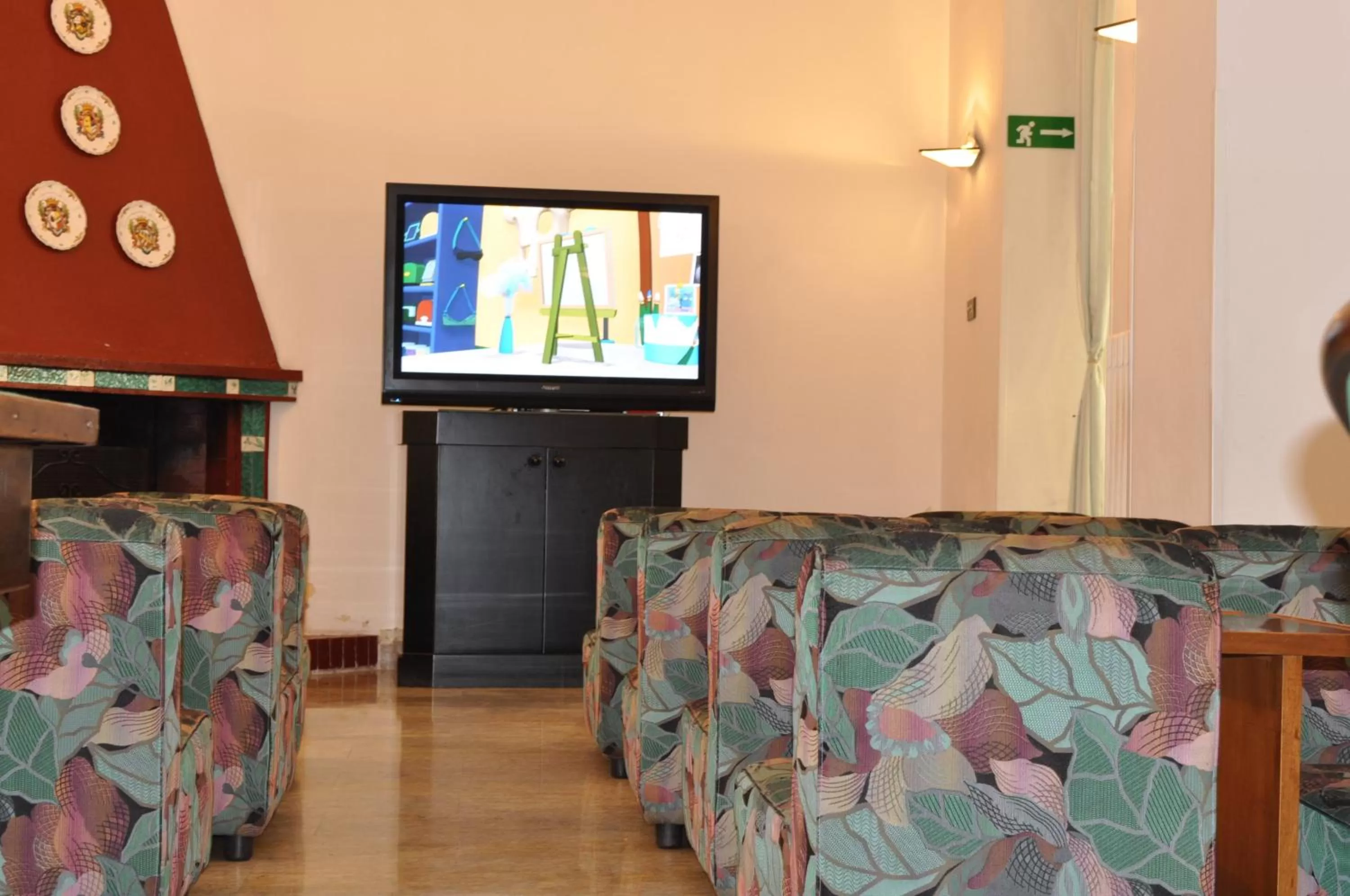 Communal lounge/ TV room in Hotel Roma