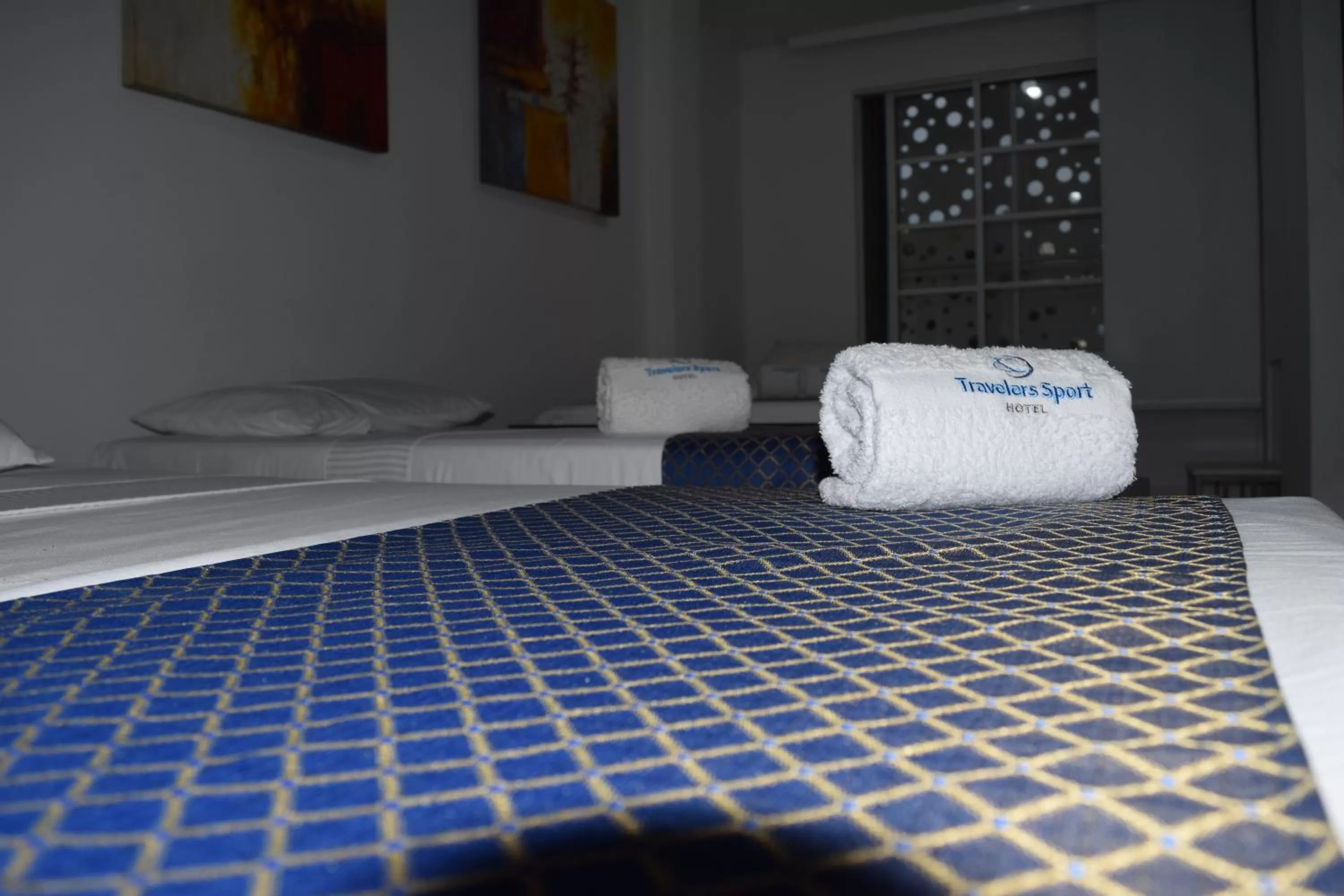 Bed in Hotel Travelers Sport