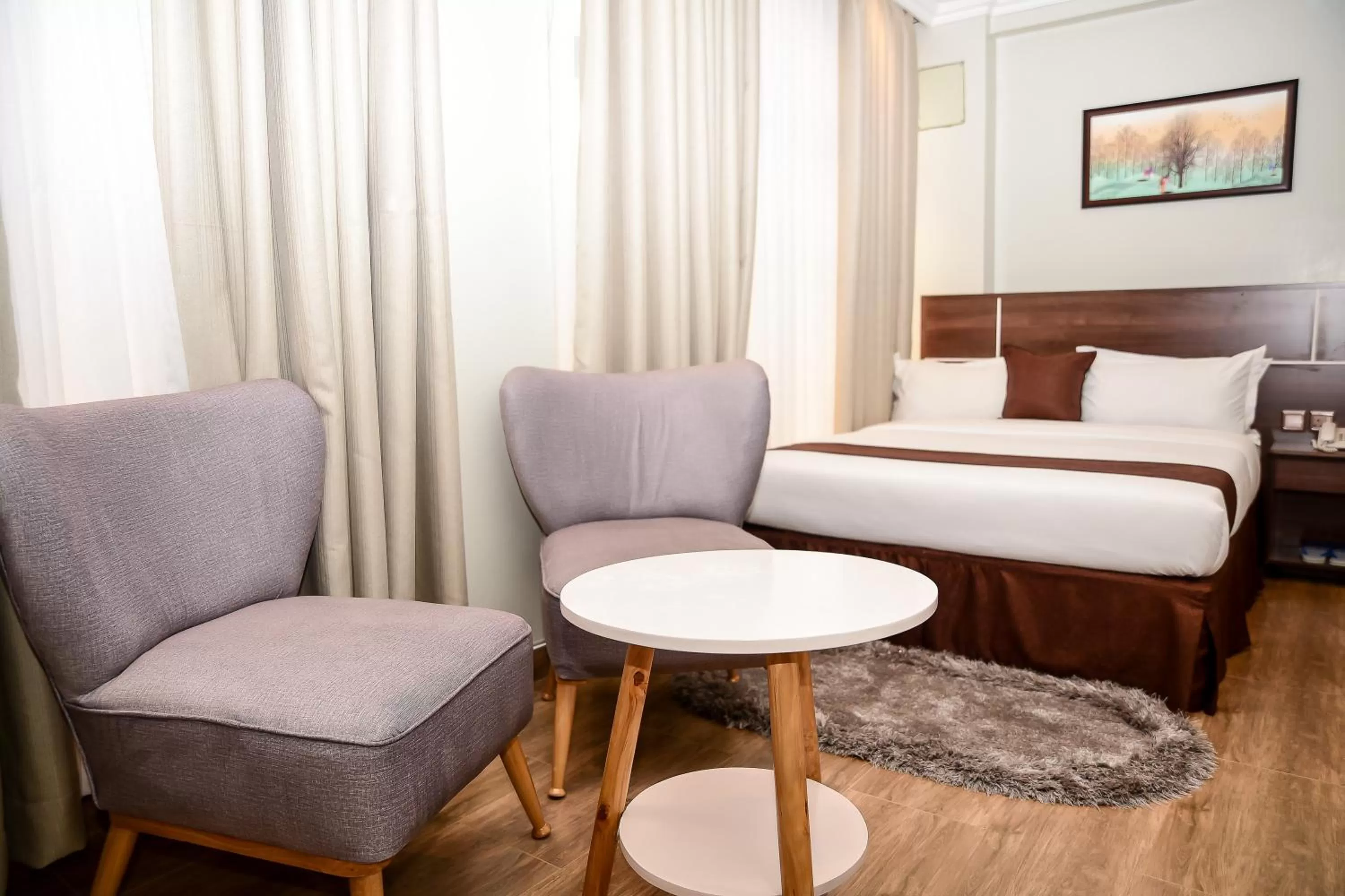 Seating area, Bed in LA BEILA HOTEL MERU