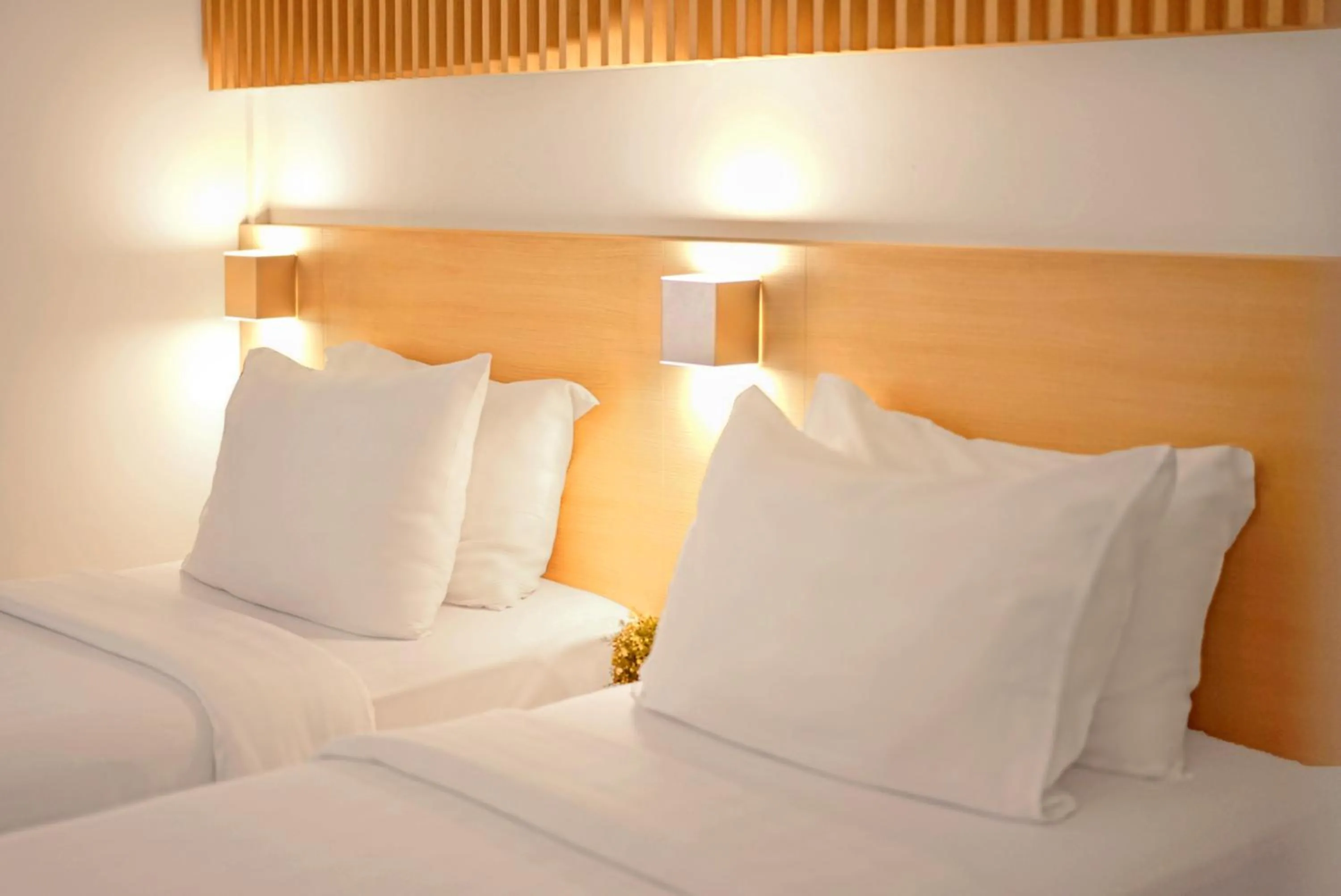 Bed in Malaka Hotel Bandung