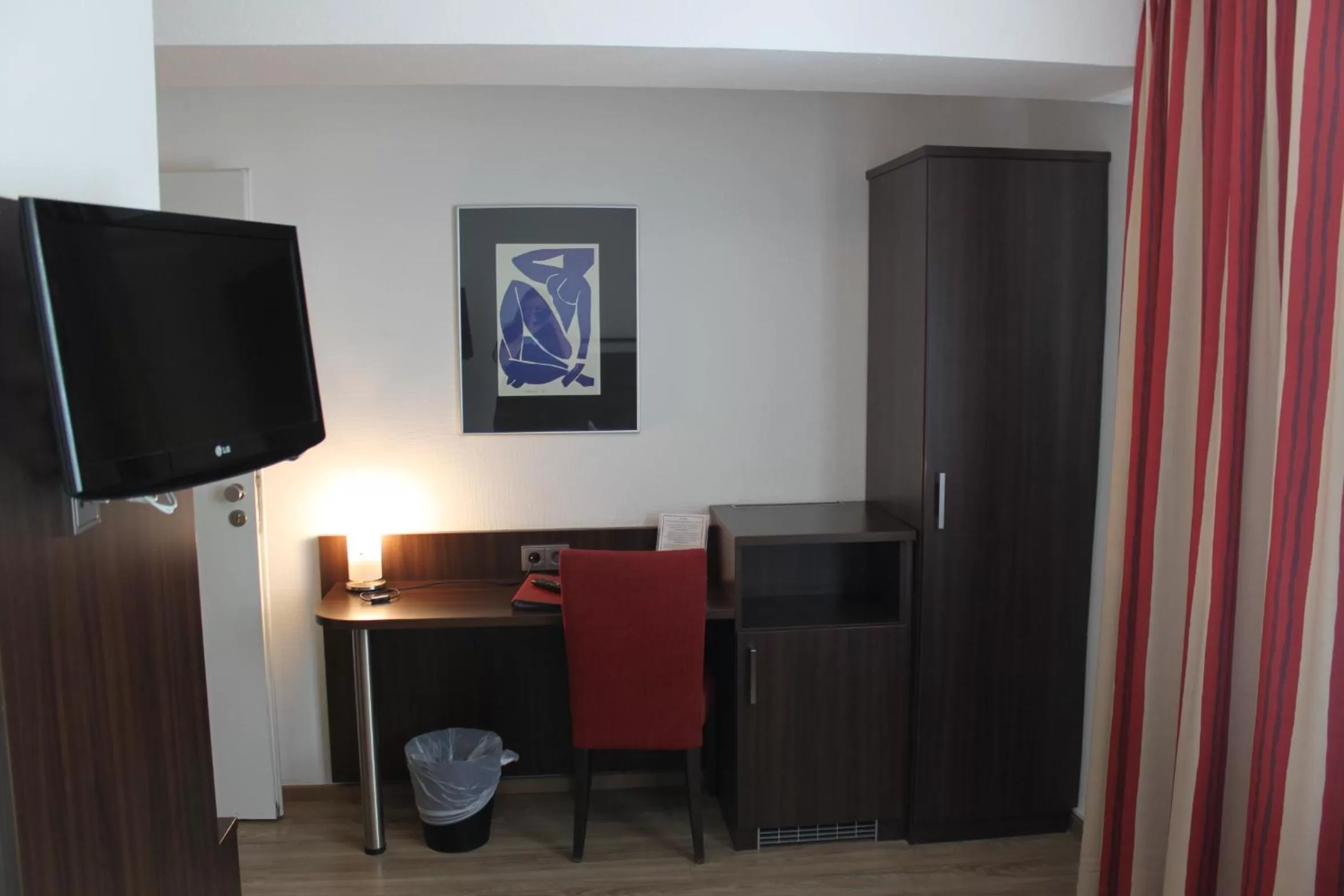 Photo of the whole room, TV/Entertainment Center in Hotel Am Römerwall