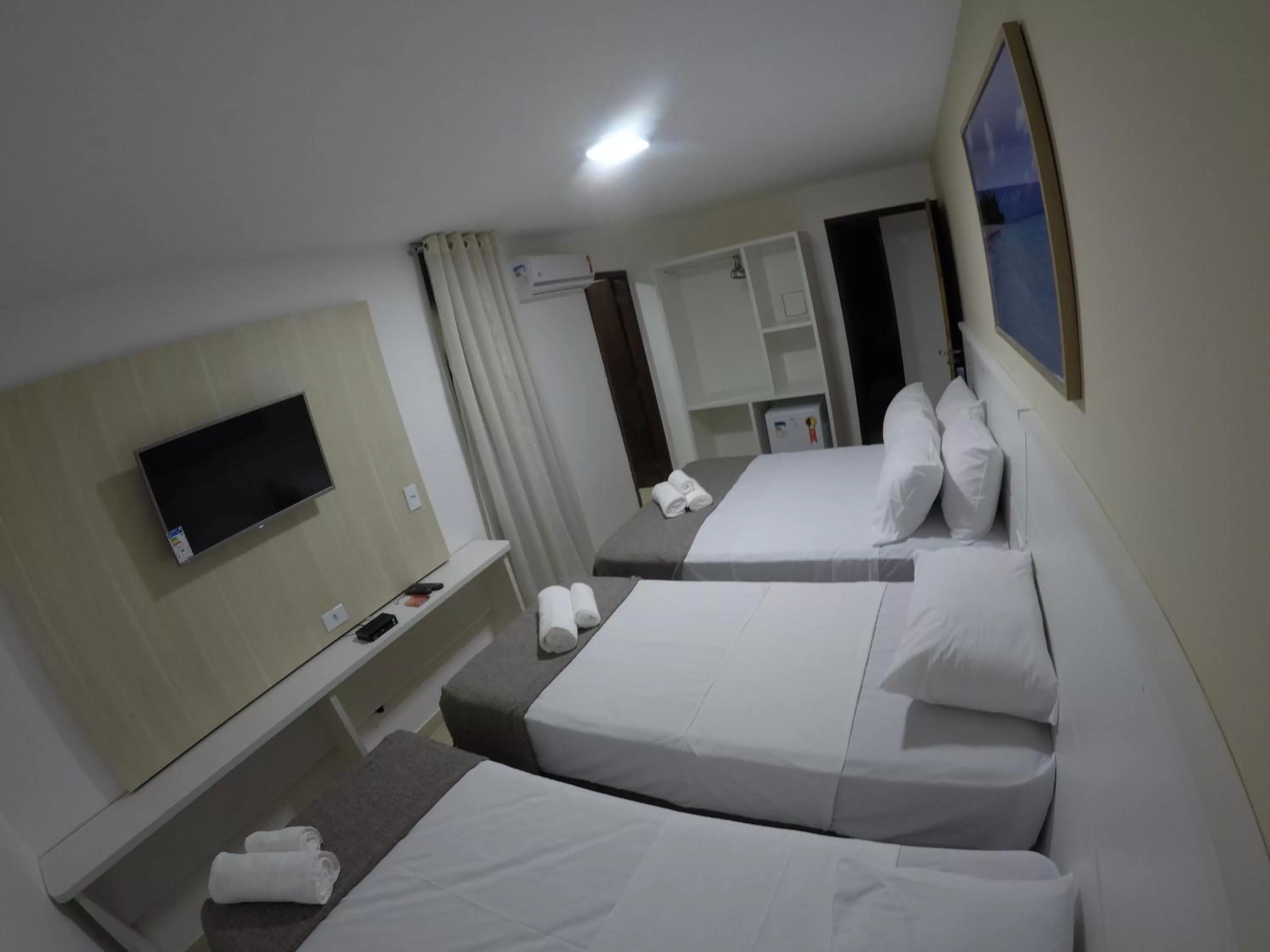 Bed in Pousada Kanoas