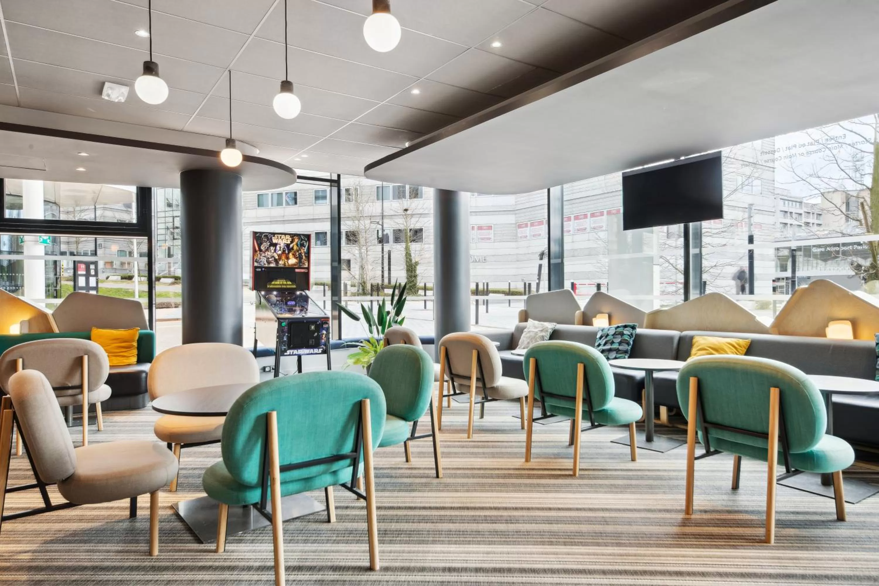 Seating area in ibis Styles Paris Charles de Gaulle Airport
