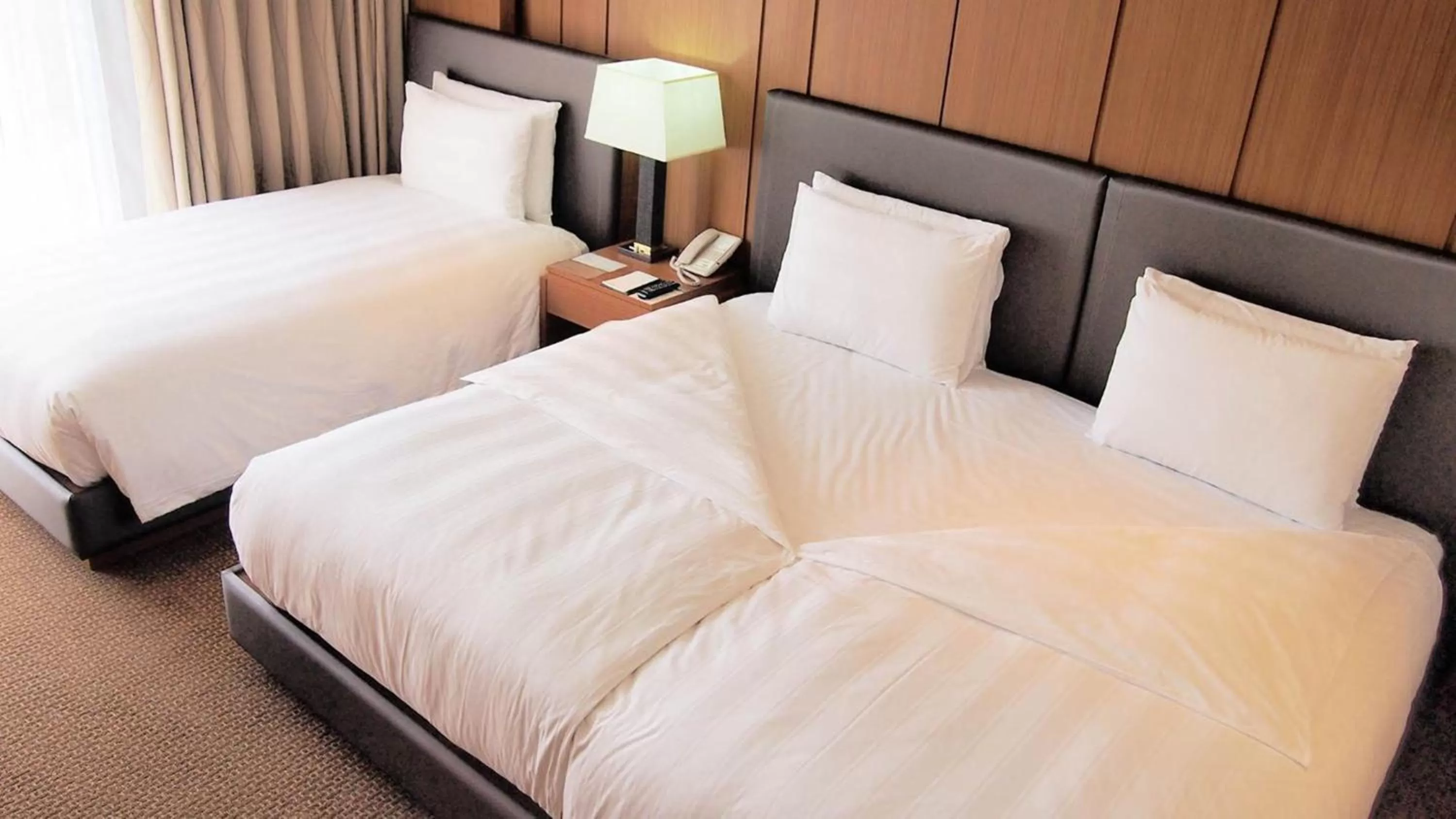 Bed in LOTTE CITY HOTEL Daejeon