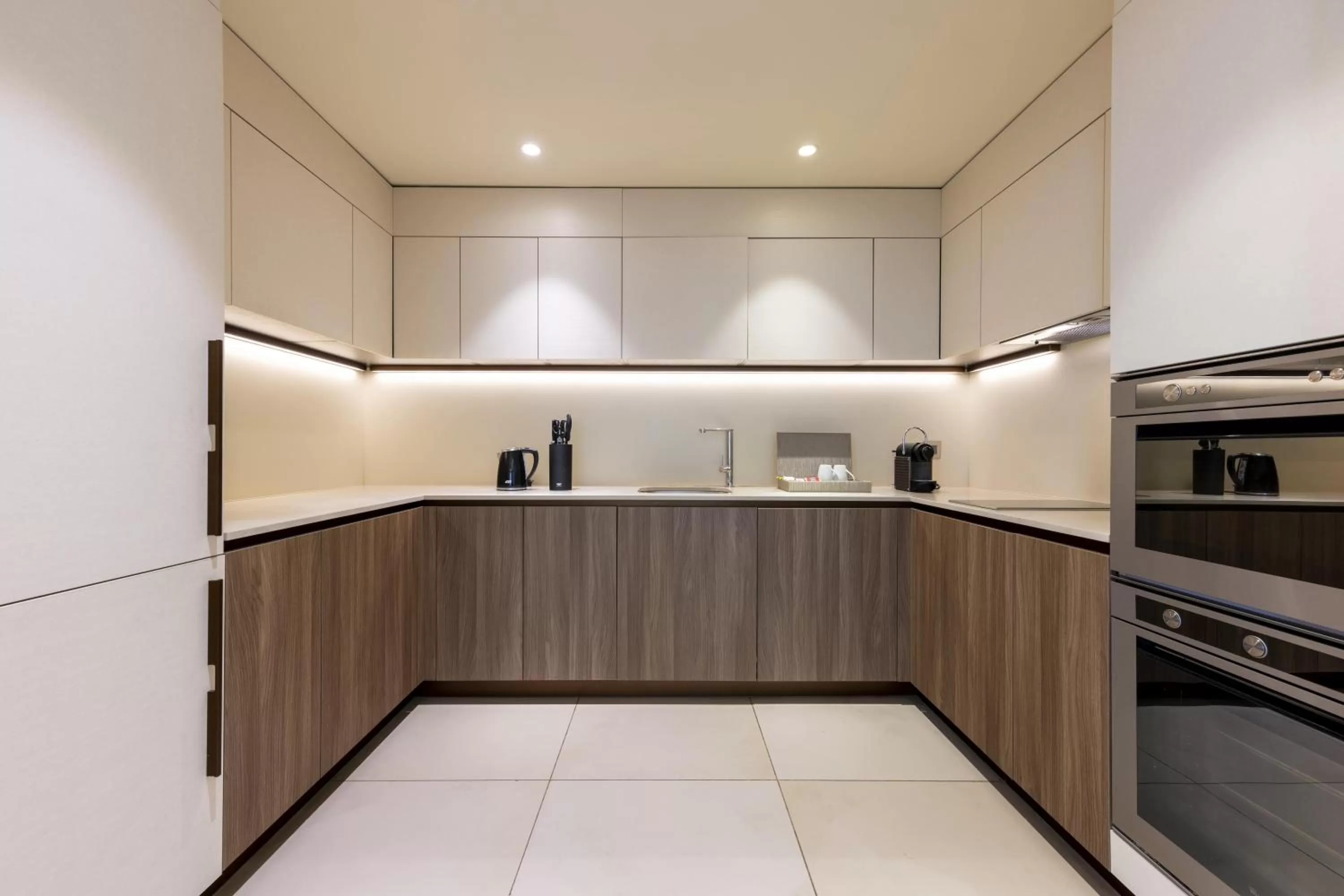 Kitchen or kitchenette in voco Doha West Bay Suites by IHG