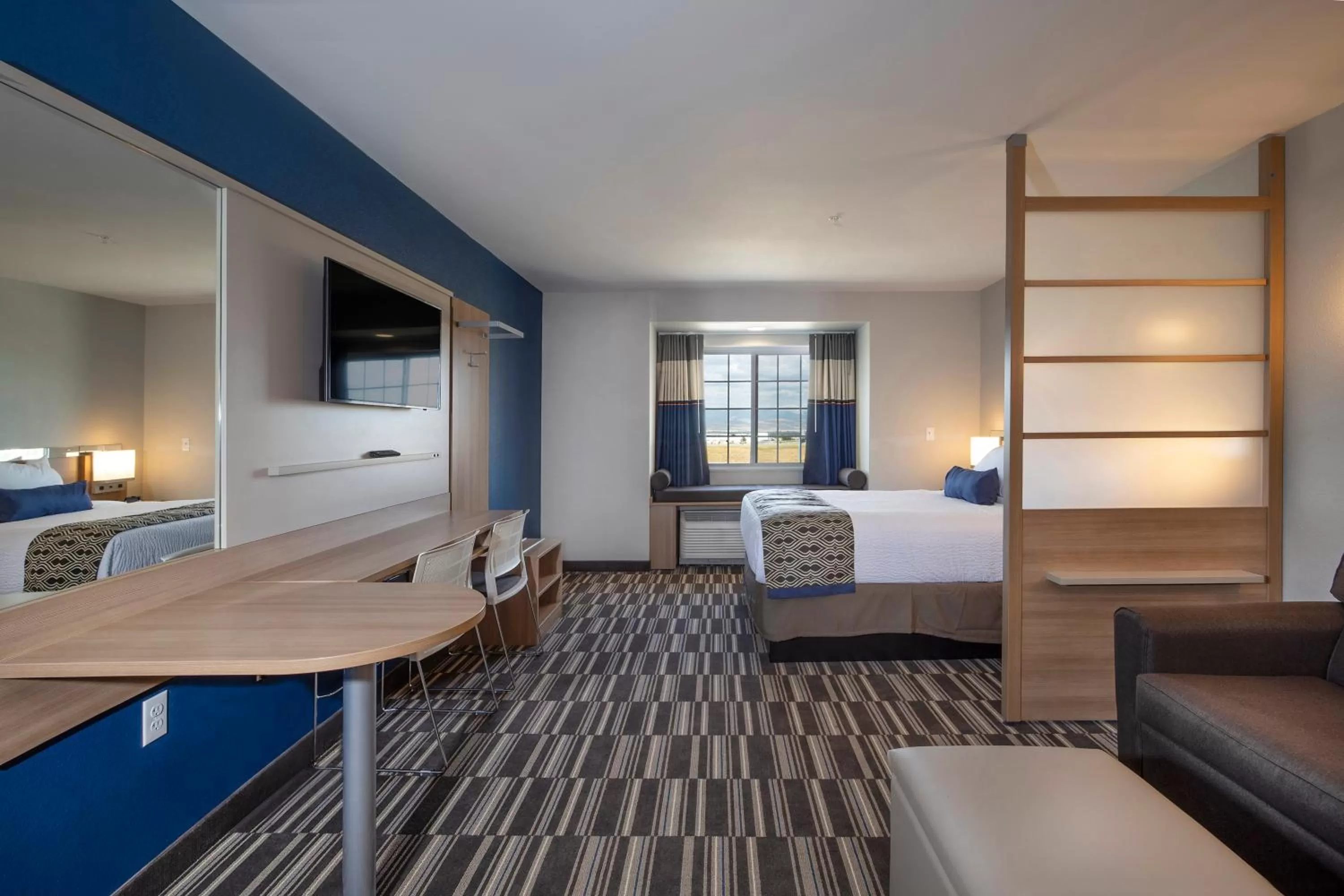 Bed in Microtel Inn & Suites by Wyndham Loveland