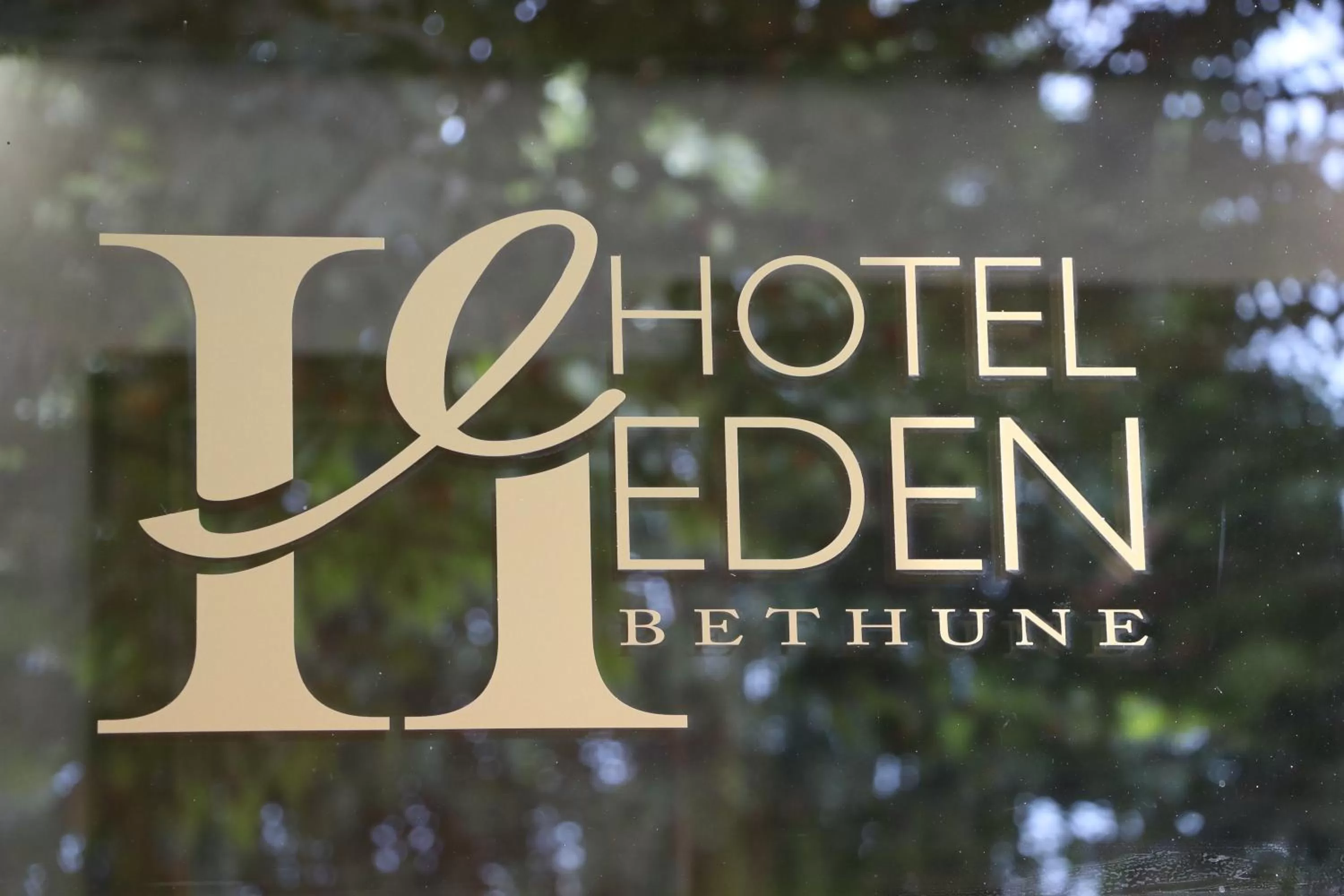 Property logo or sign in Hotel Eden