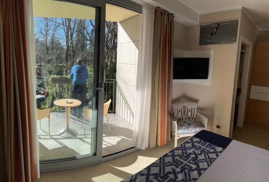 Balcony/Terrace, Bed in Hotel Sporting Brugherio