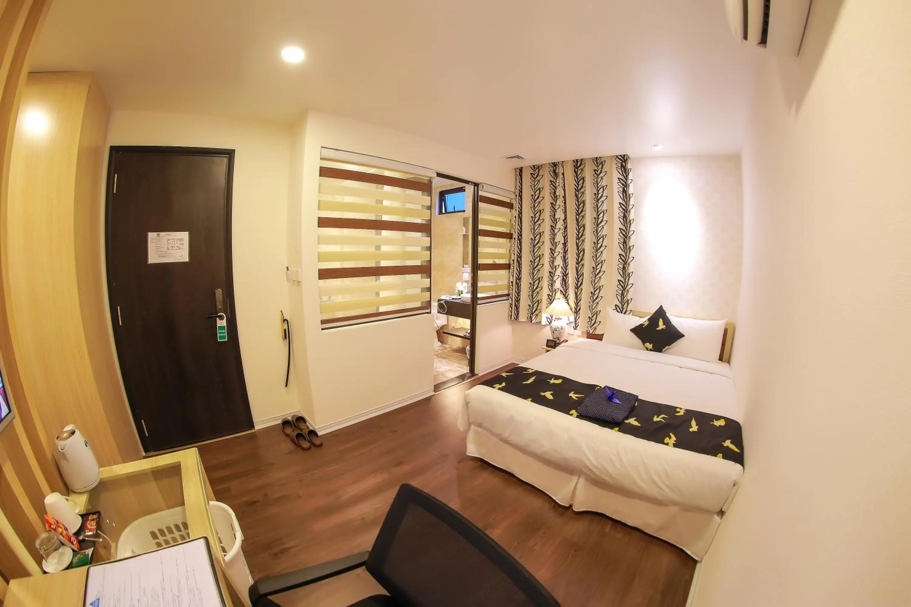 Bed in Momizi Business Hotel