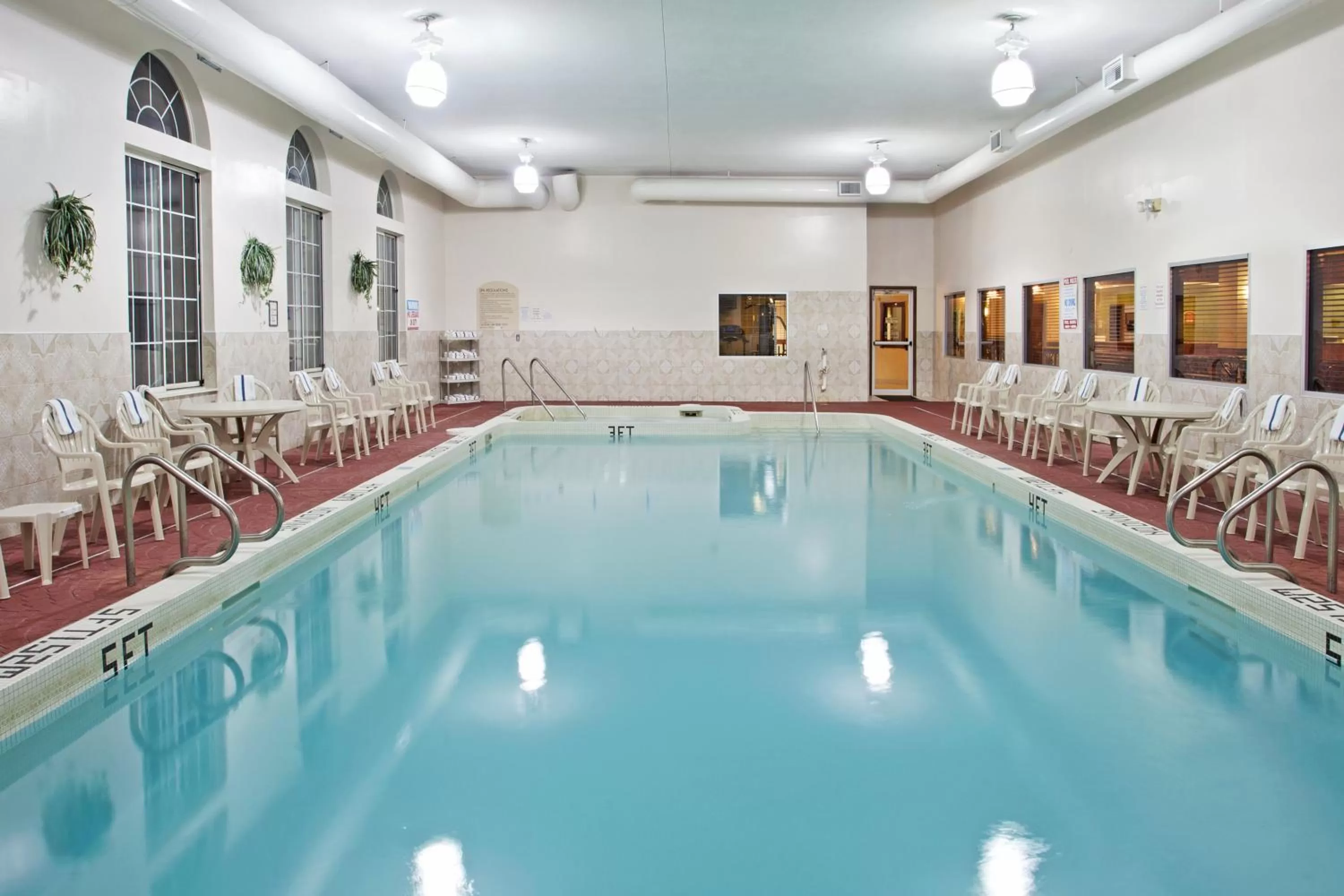 Swimming pool in Holiday Inn Express Birch Run-Frankenmuth Area by IHG