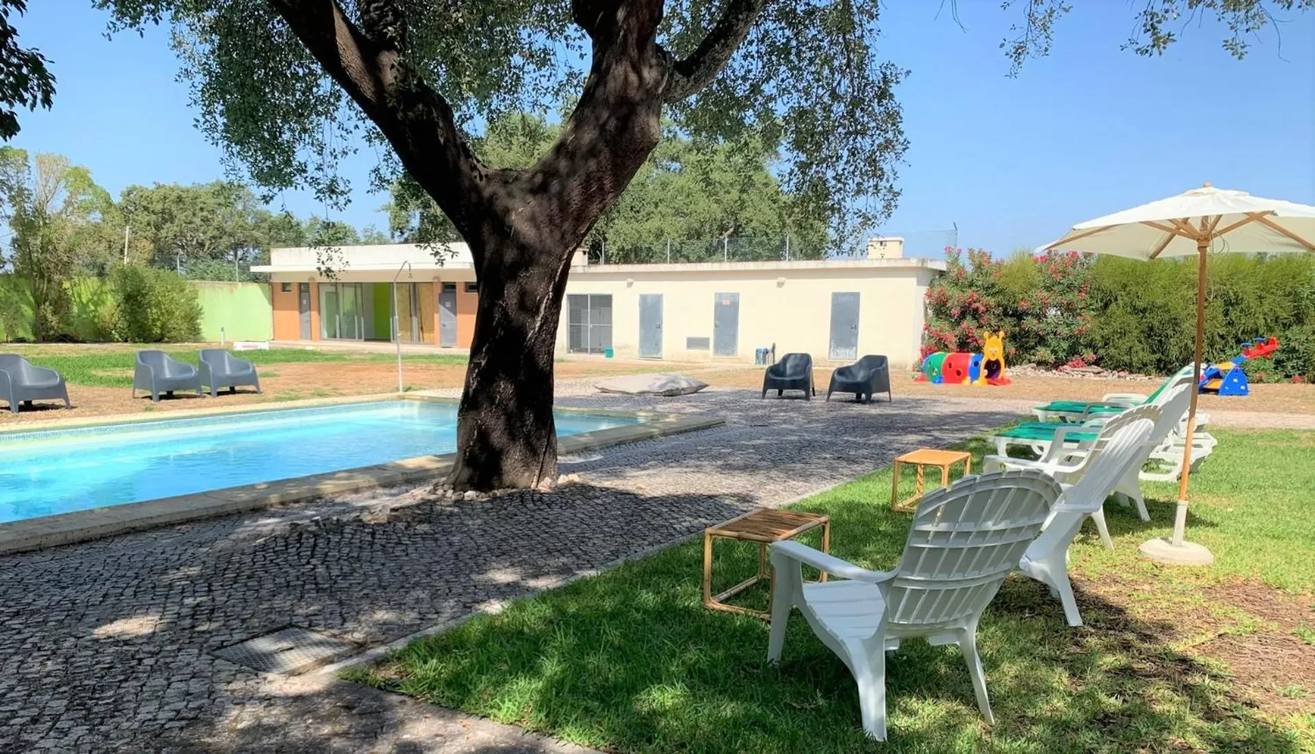 Swimming pool in Amazonia Palmela Apartamentos Turisticos