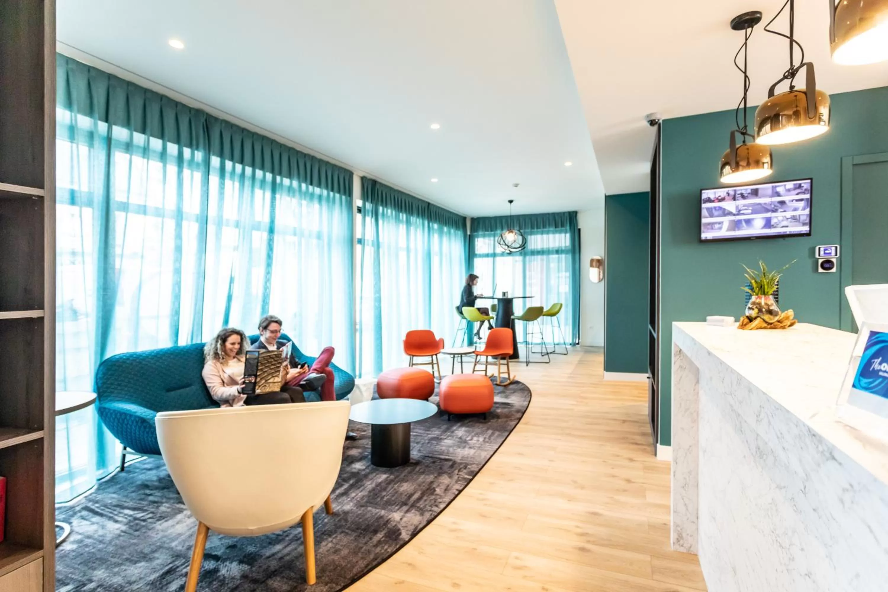 Communal lounge/ TV room in Hôtel The Originals City Le Berry - proche centre-ville - Gare - parking - recharge véhicule