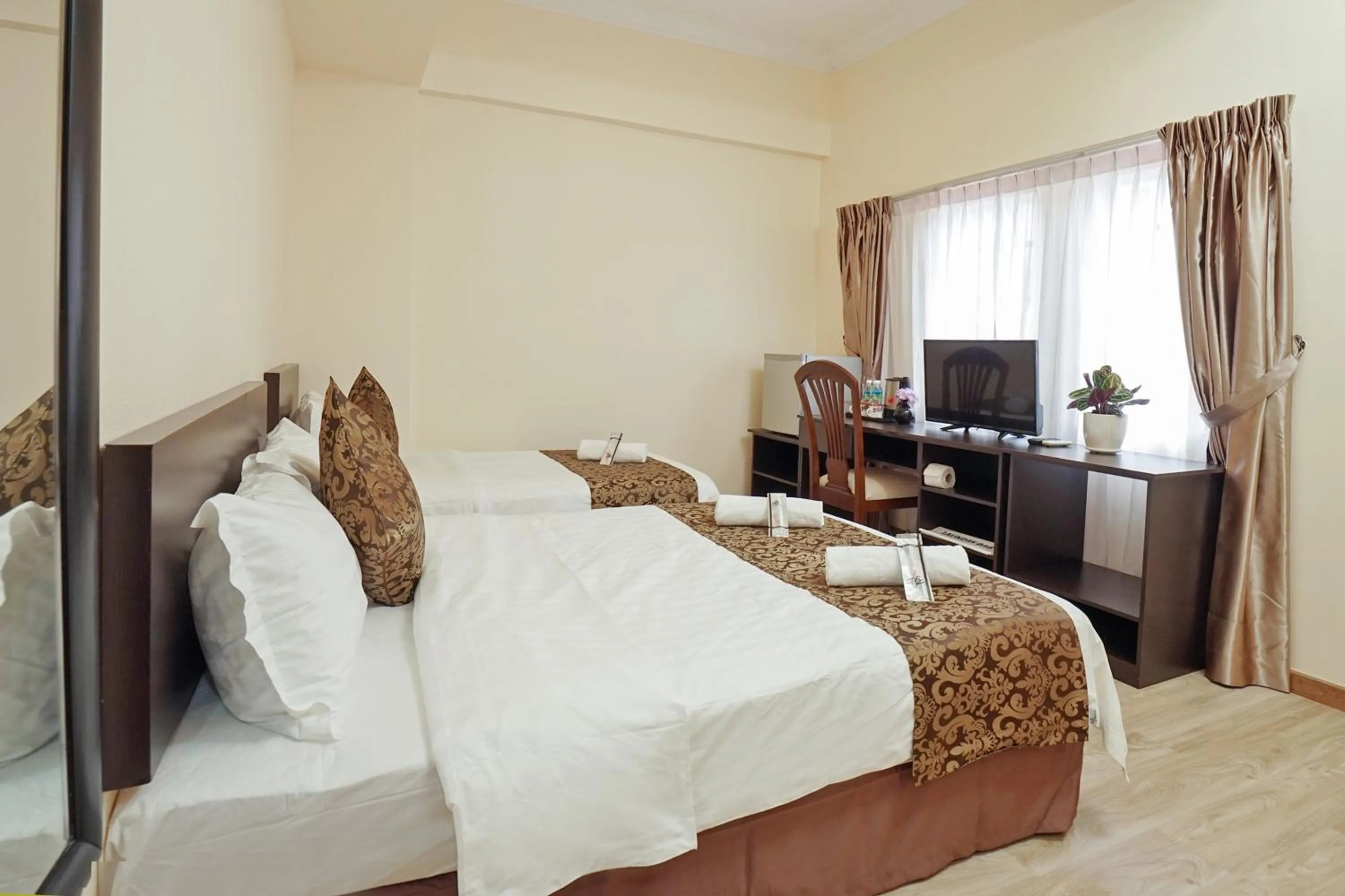 Photo of the whole room, Bed in RJ Hotel Kulai