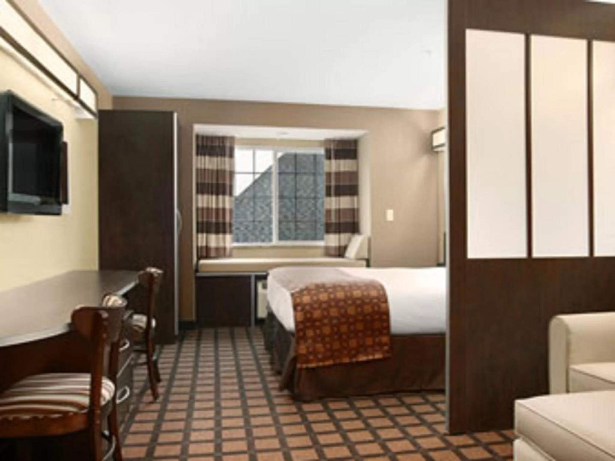 Decorative detail, Bed in Microtel Inn & Suites Mansfield PA