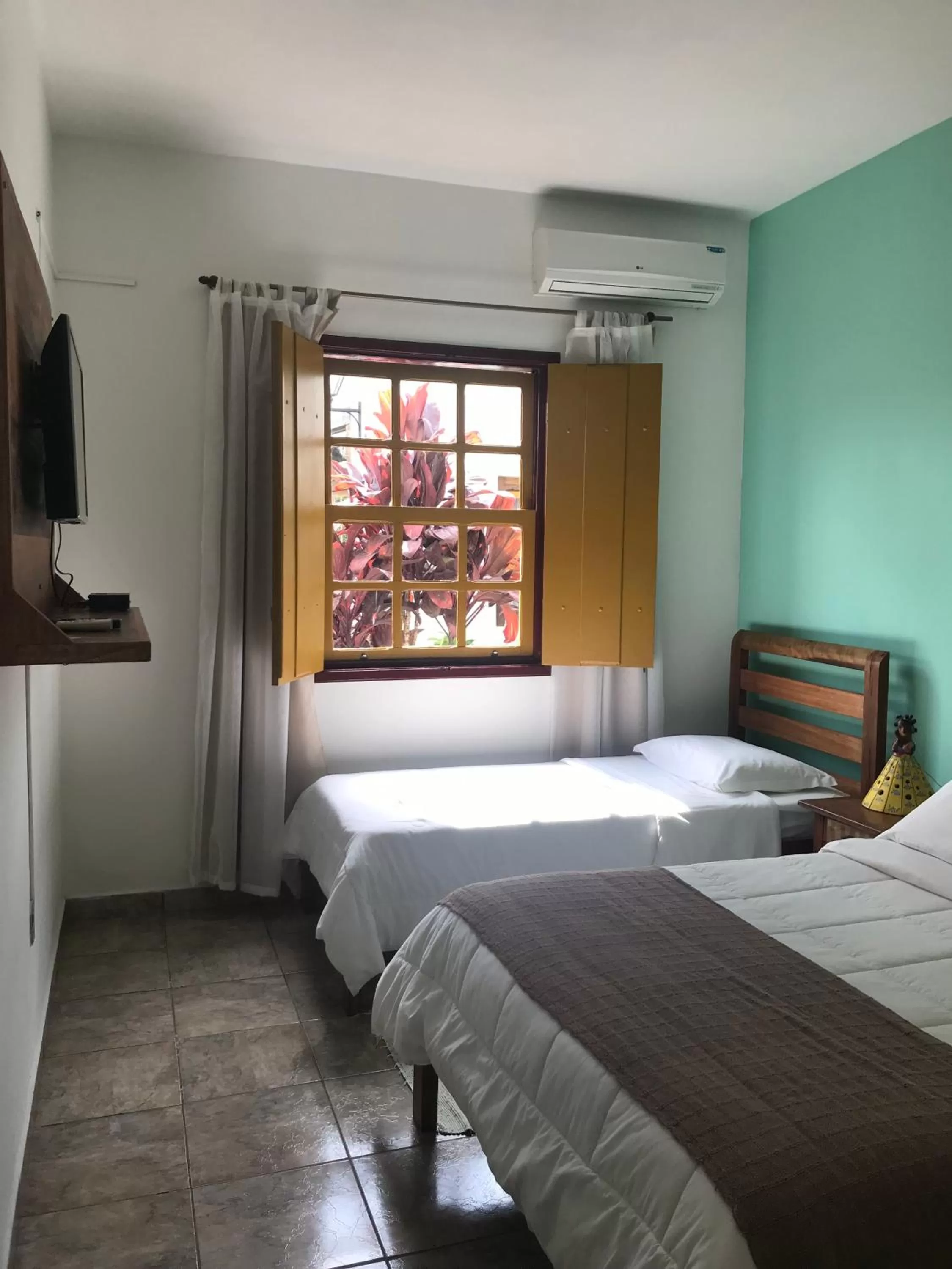 Bed in Pousada Neuza Barbosa