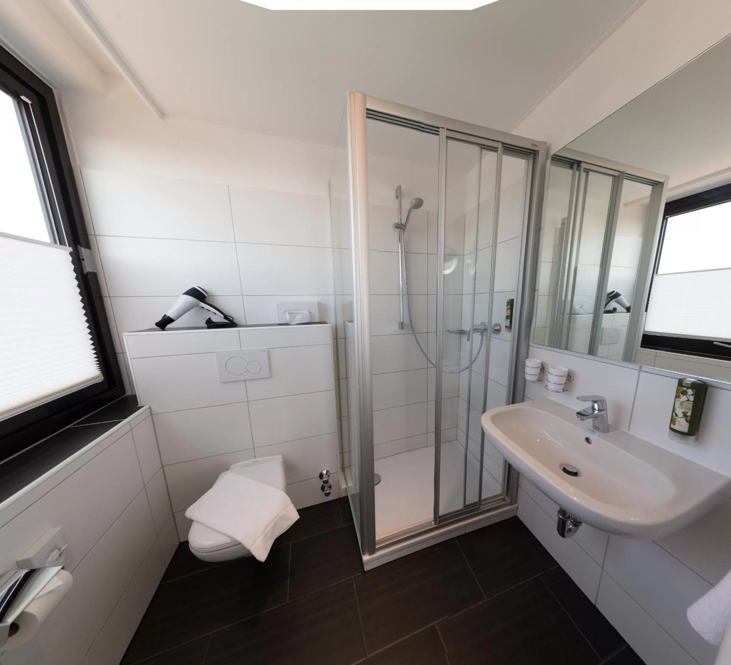 Photo of the whole room, Bathroom in Wellness Hotel Harms