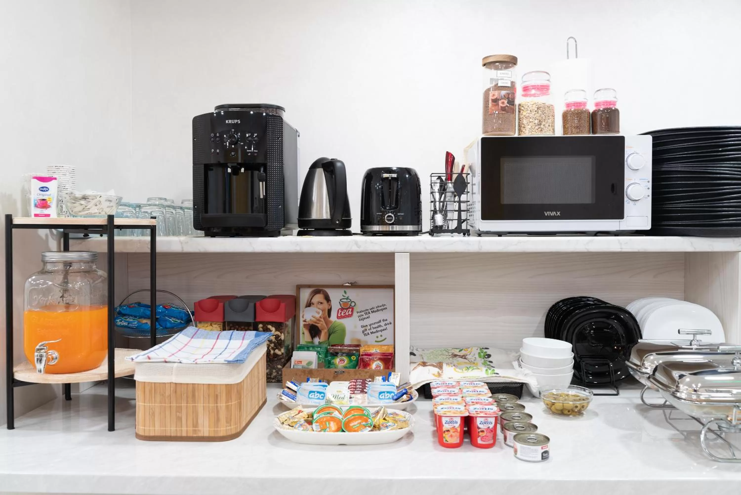 Kitchen or kitchenette in Ornament Hotel and Apartments