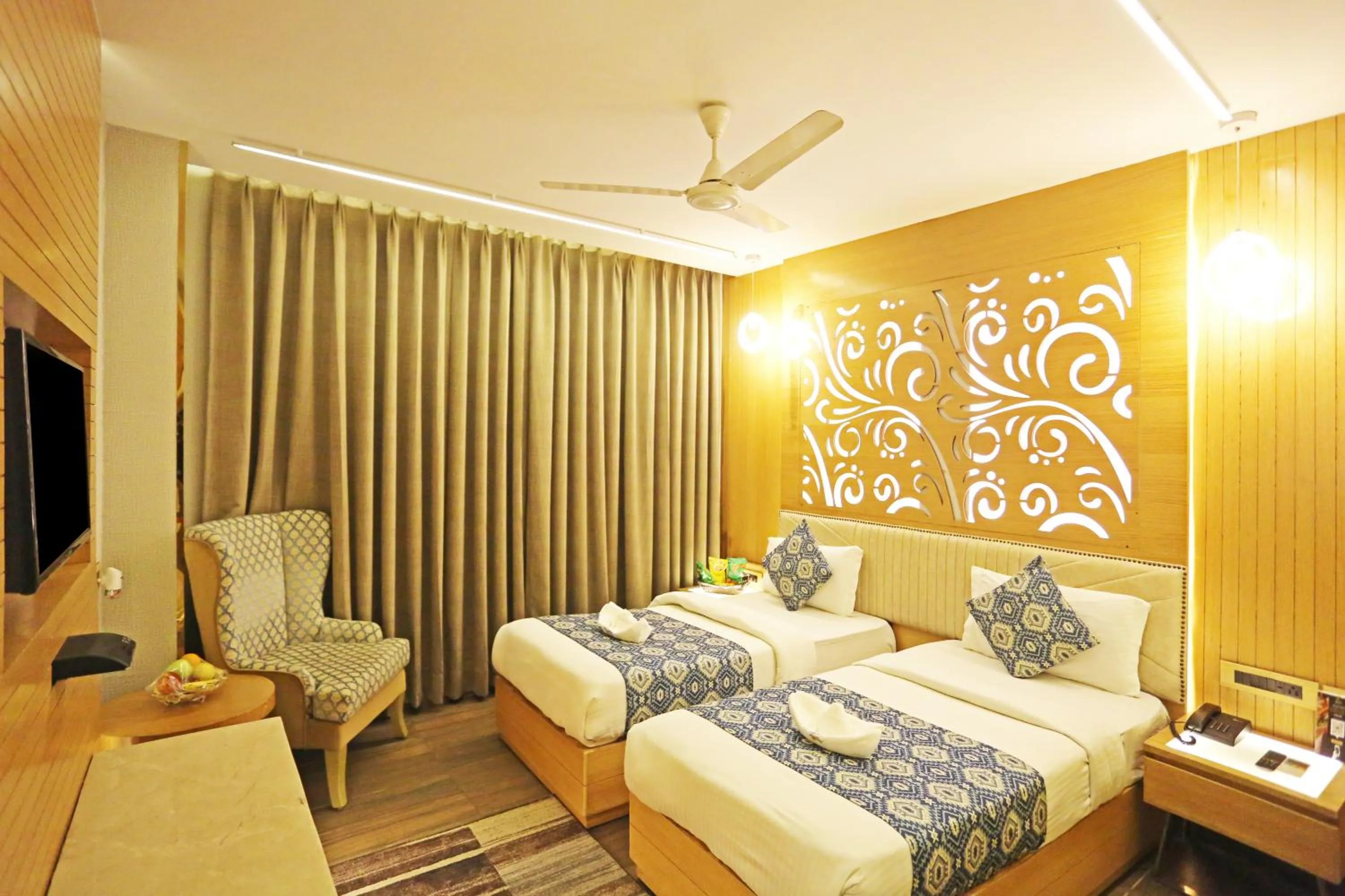 Bed in JRD Luxury-Business Hotel