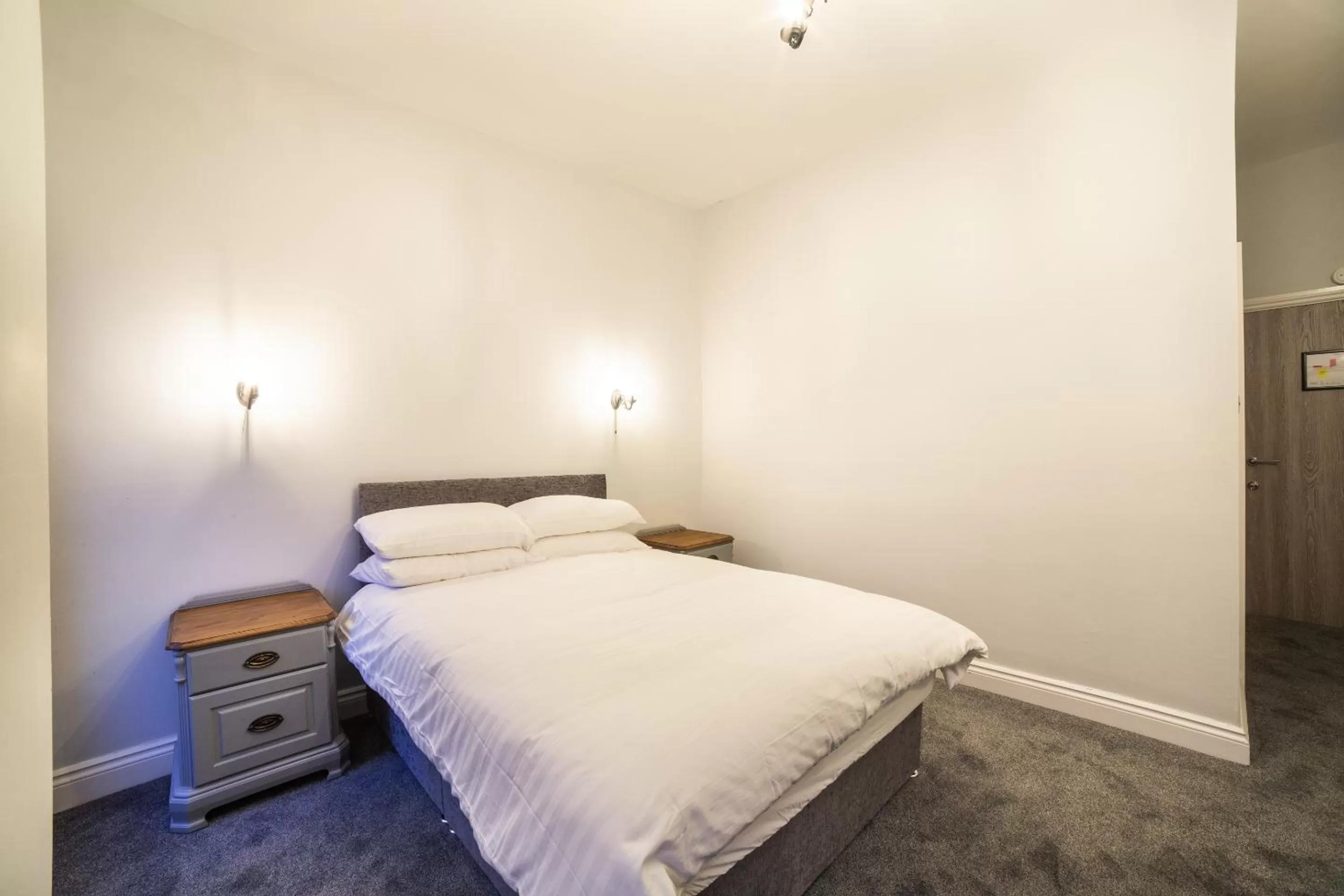 Bed in Churchill's Hotel