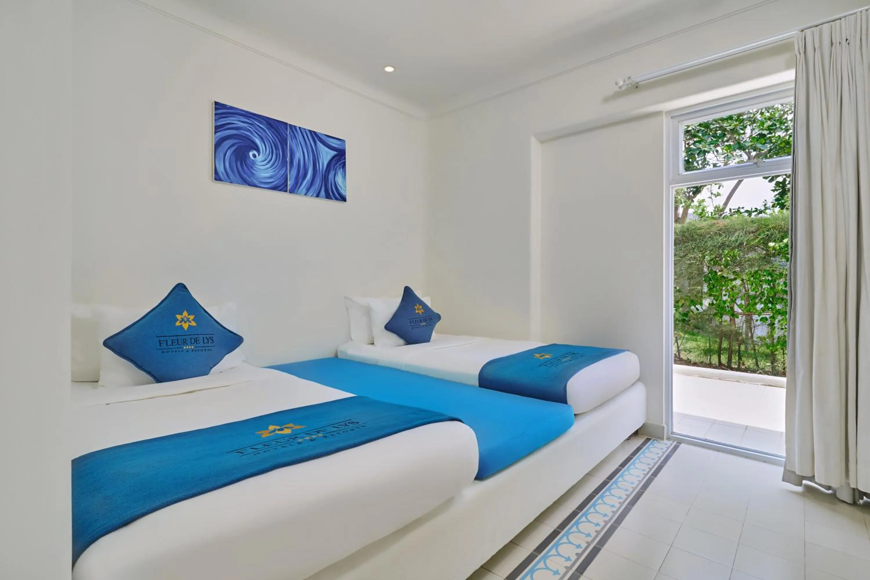 Bed in Fleur de Lys Resort & Spa Long Hai