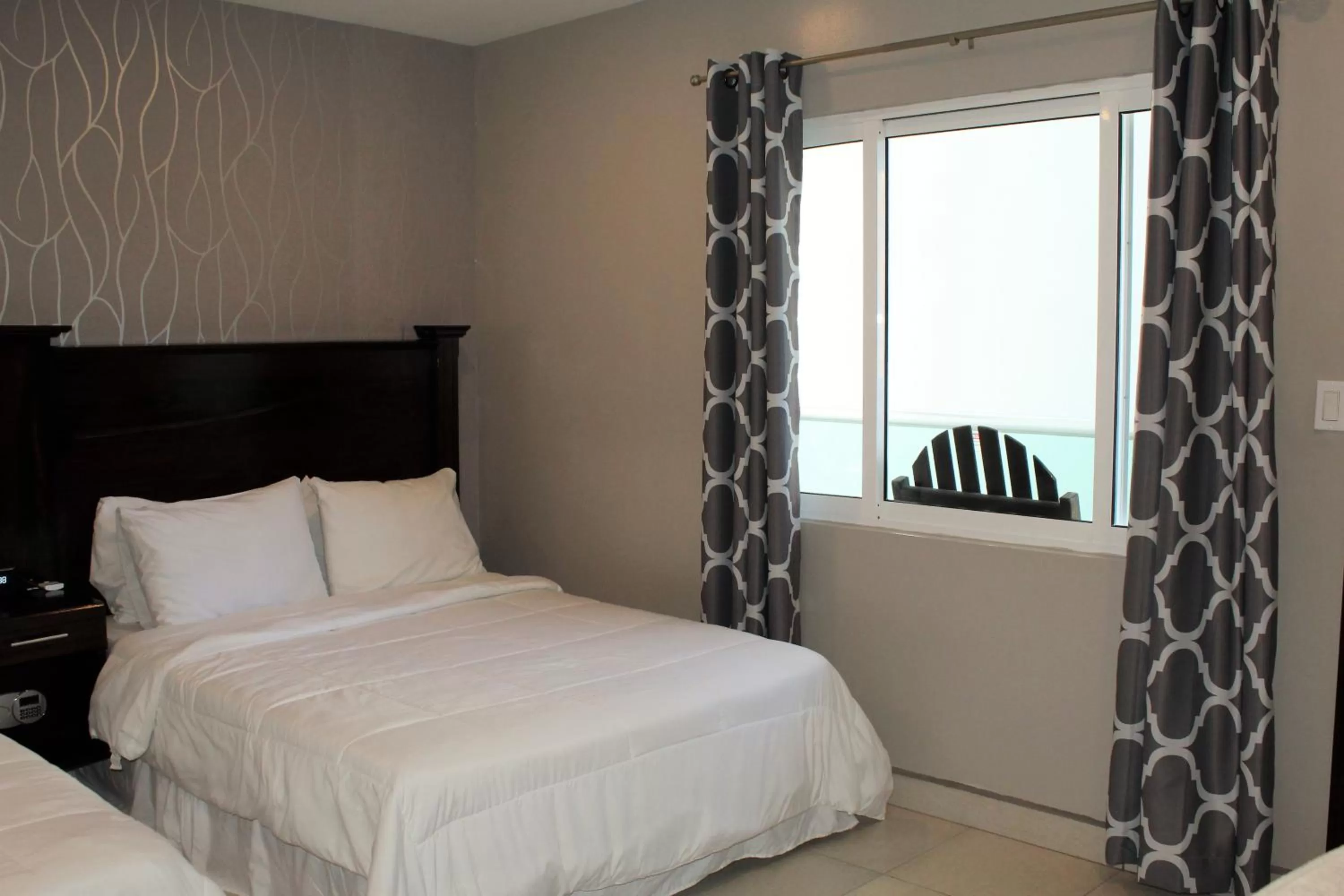 Bed in Barefoot Caye Caulker Hotel