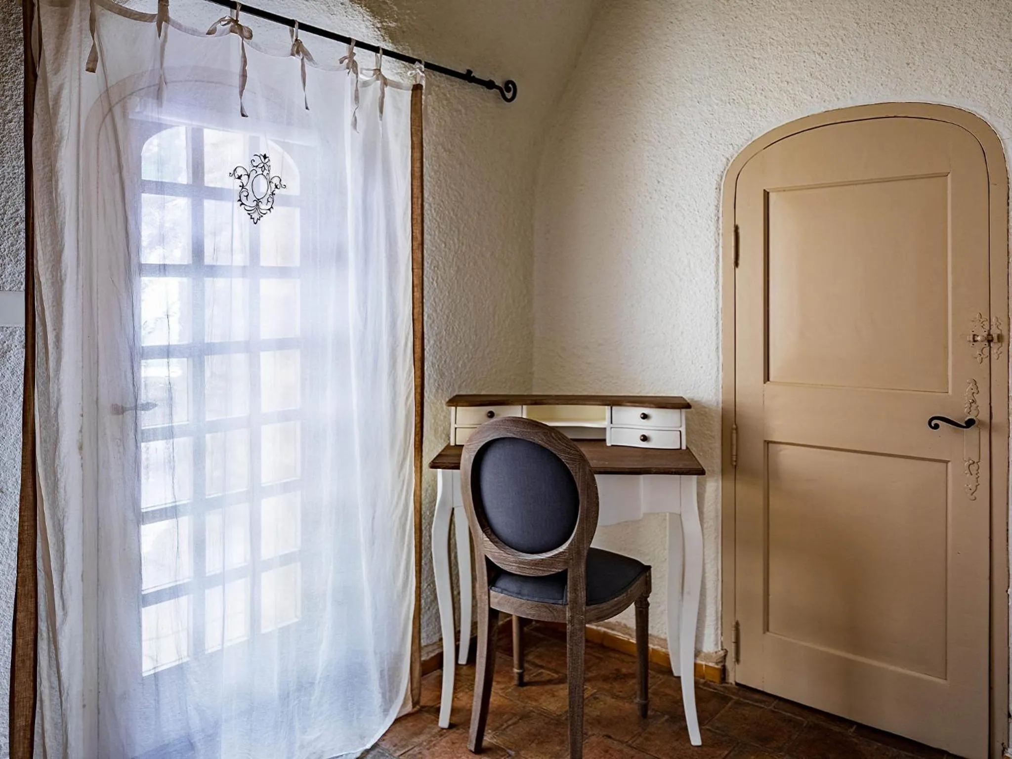 Seating area in Garrigae Abbaye de Sainte Croix