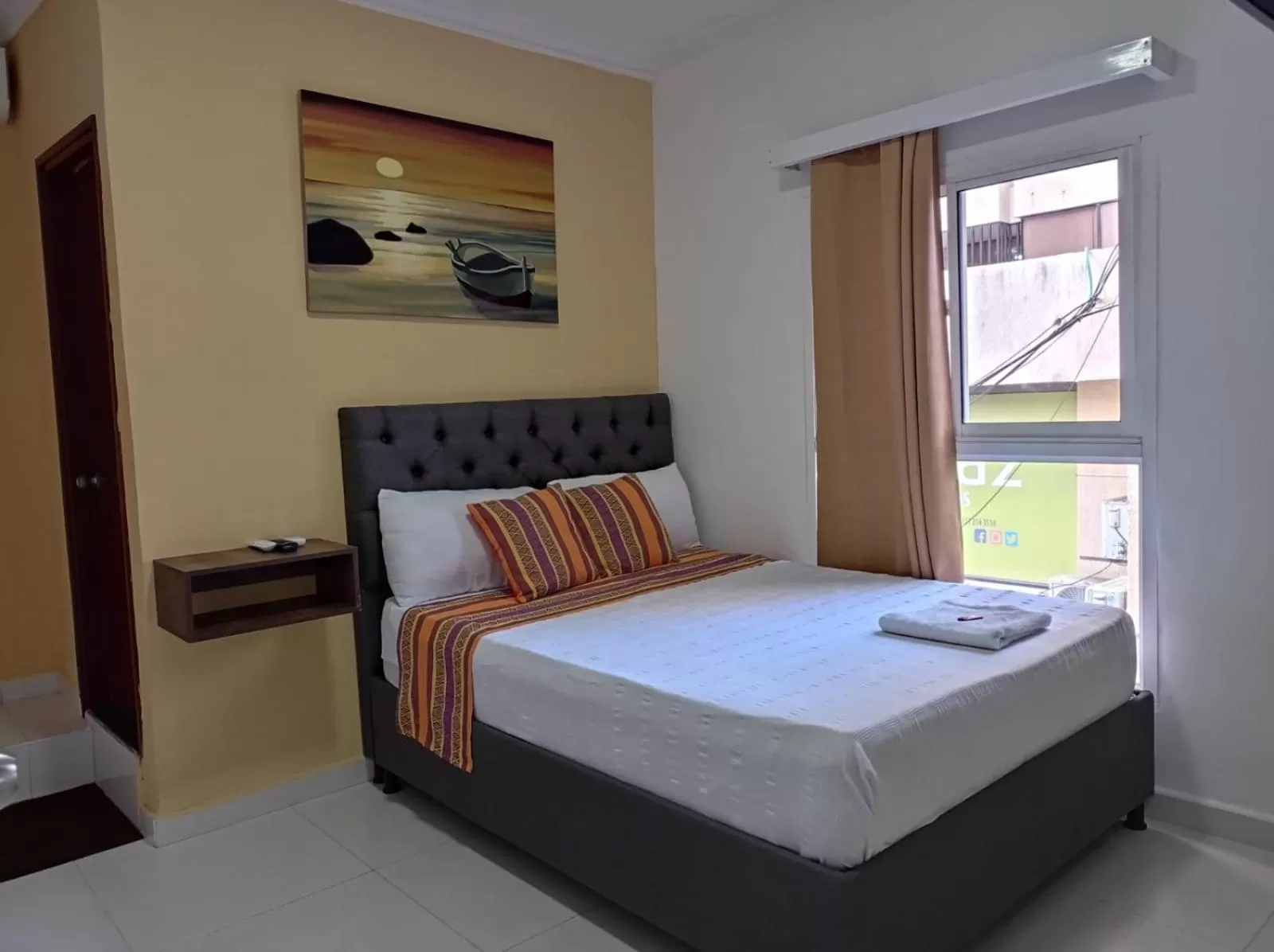 Bed in ANAJIRAWAA HOTEL