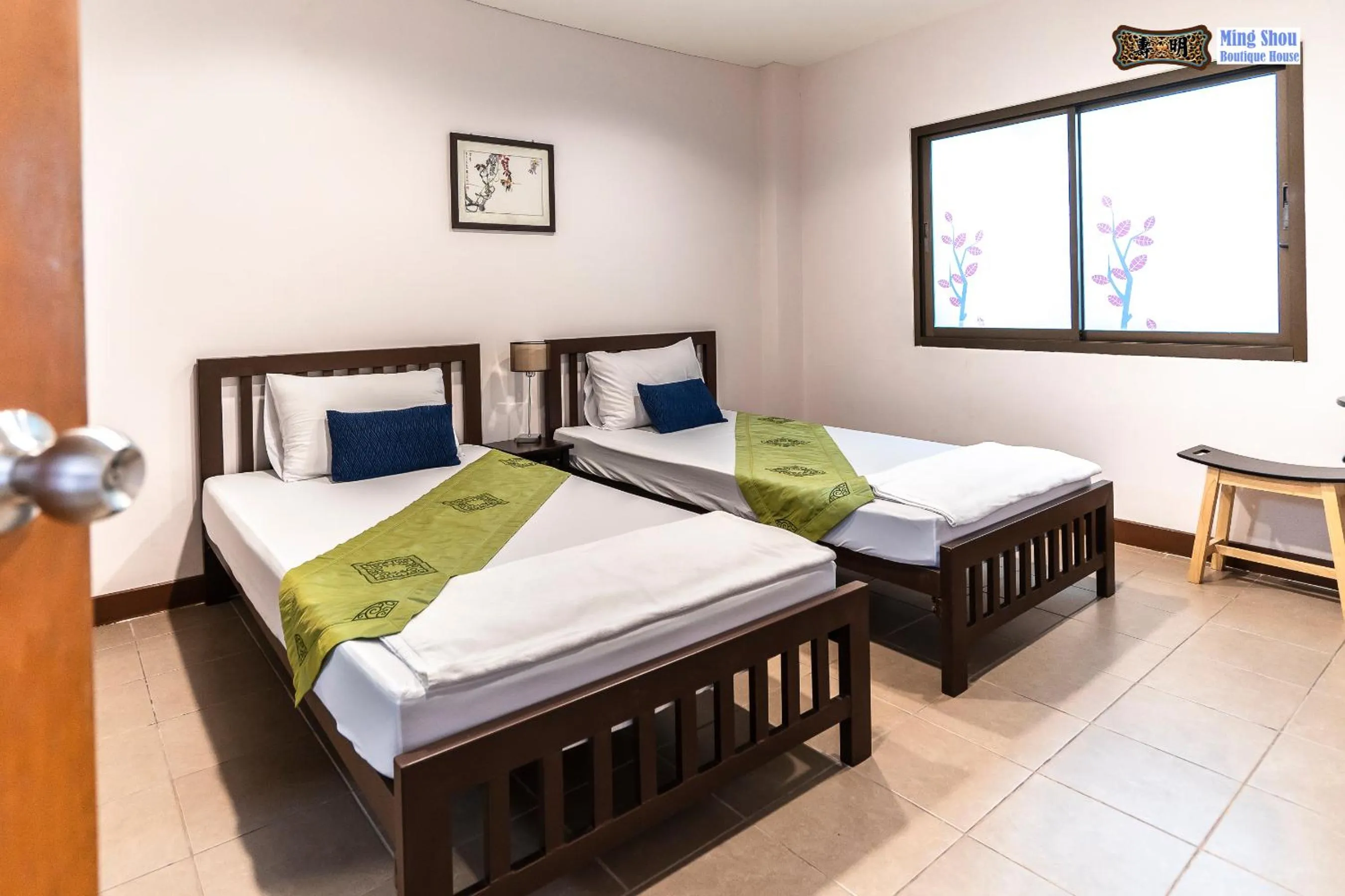 Bed in Ming Shou Boutique House