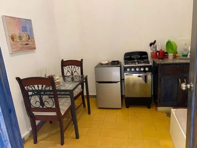 Kitchen/Kitchenette in Chao Mamá Hostal