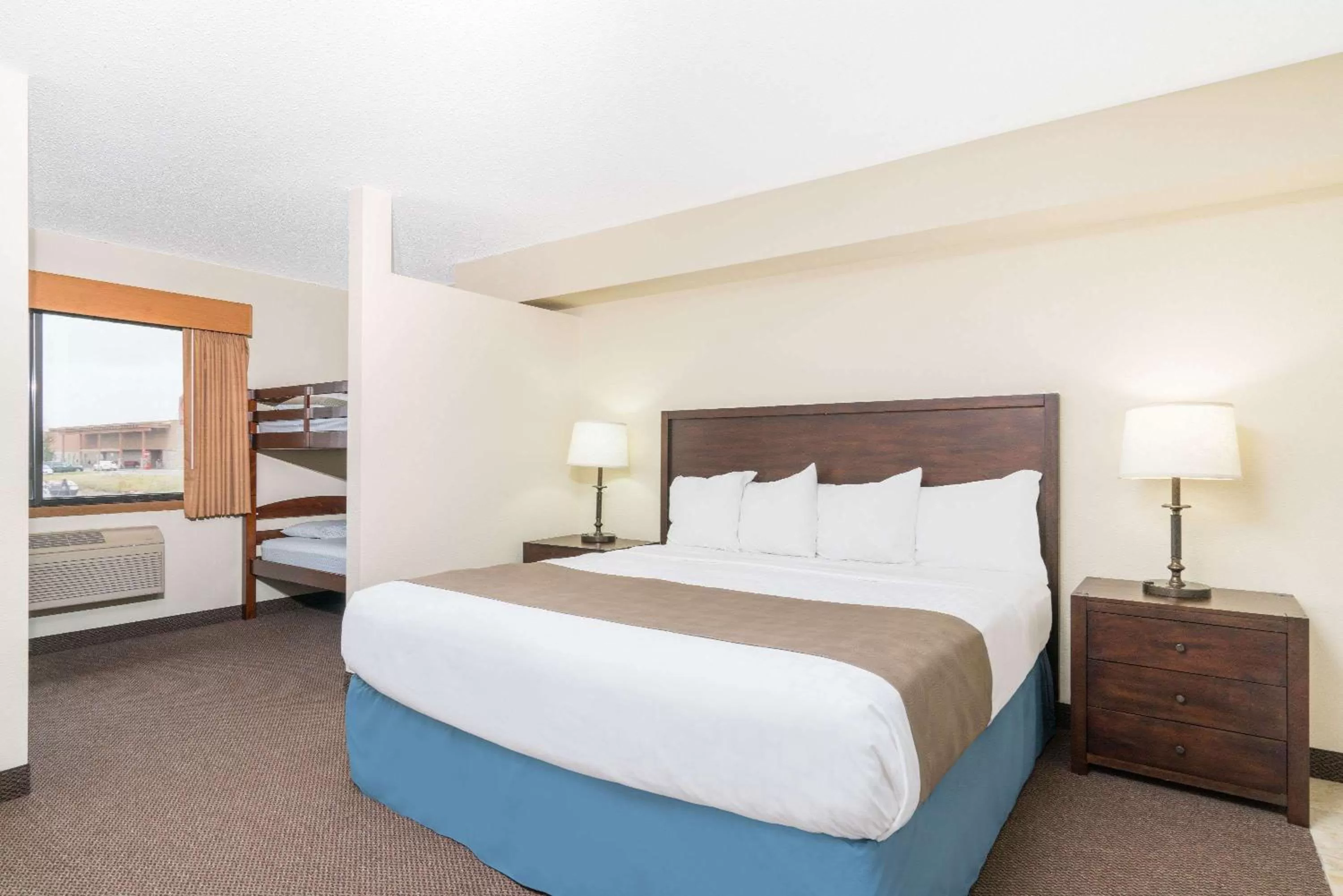 Photo of the whole room, Bed in Days Inn & Suites by Wyndham Baxter Brainerd Area