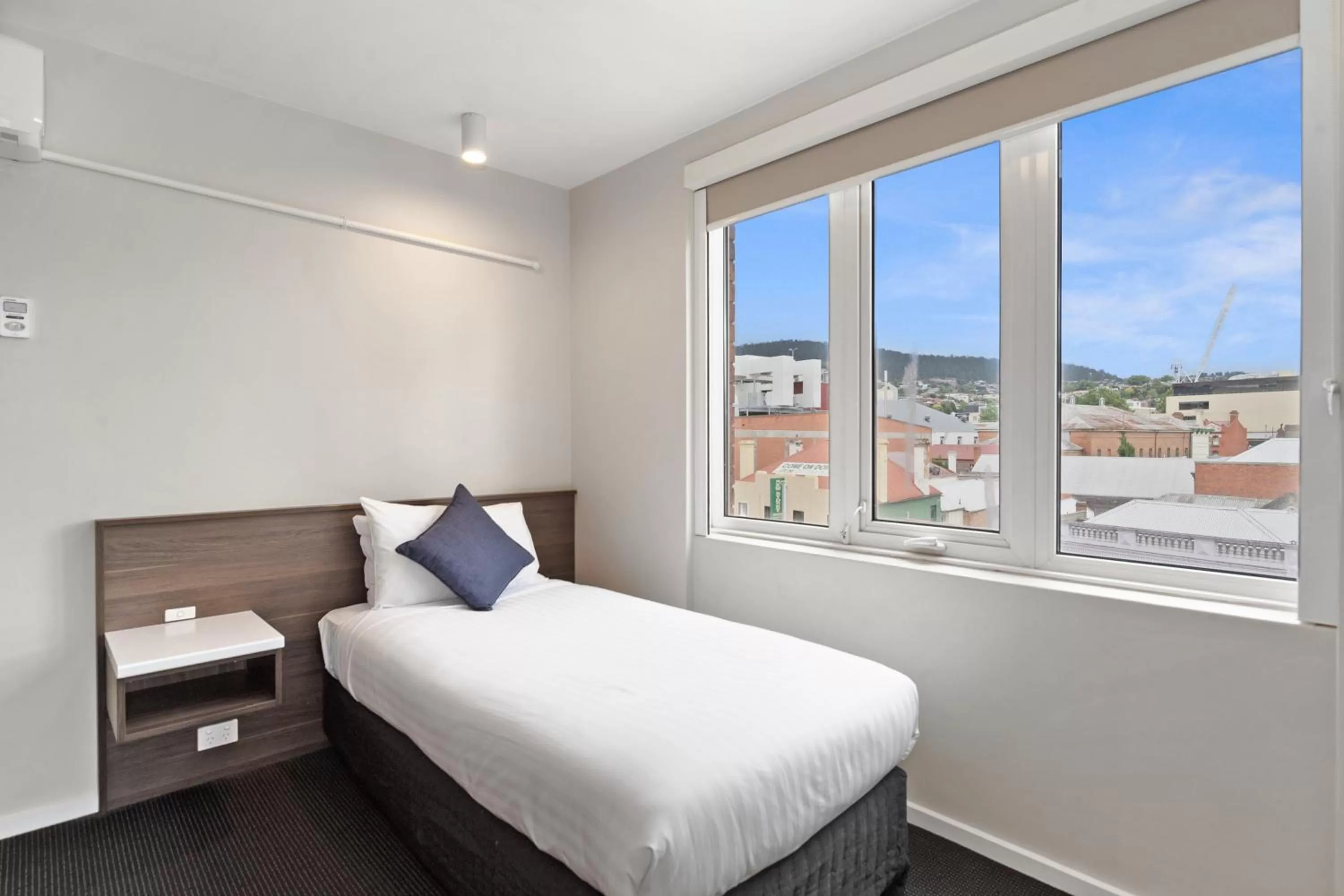 Bed in Allurity Hotel