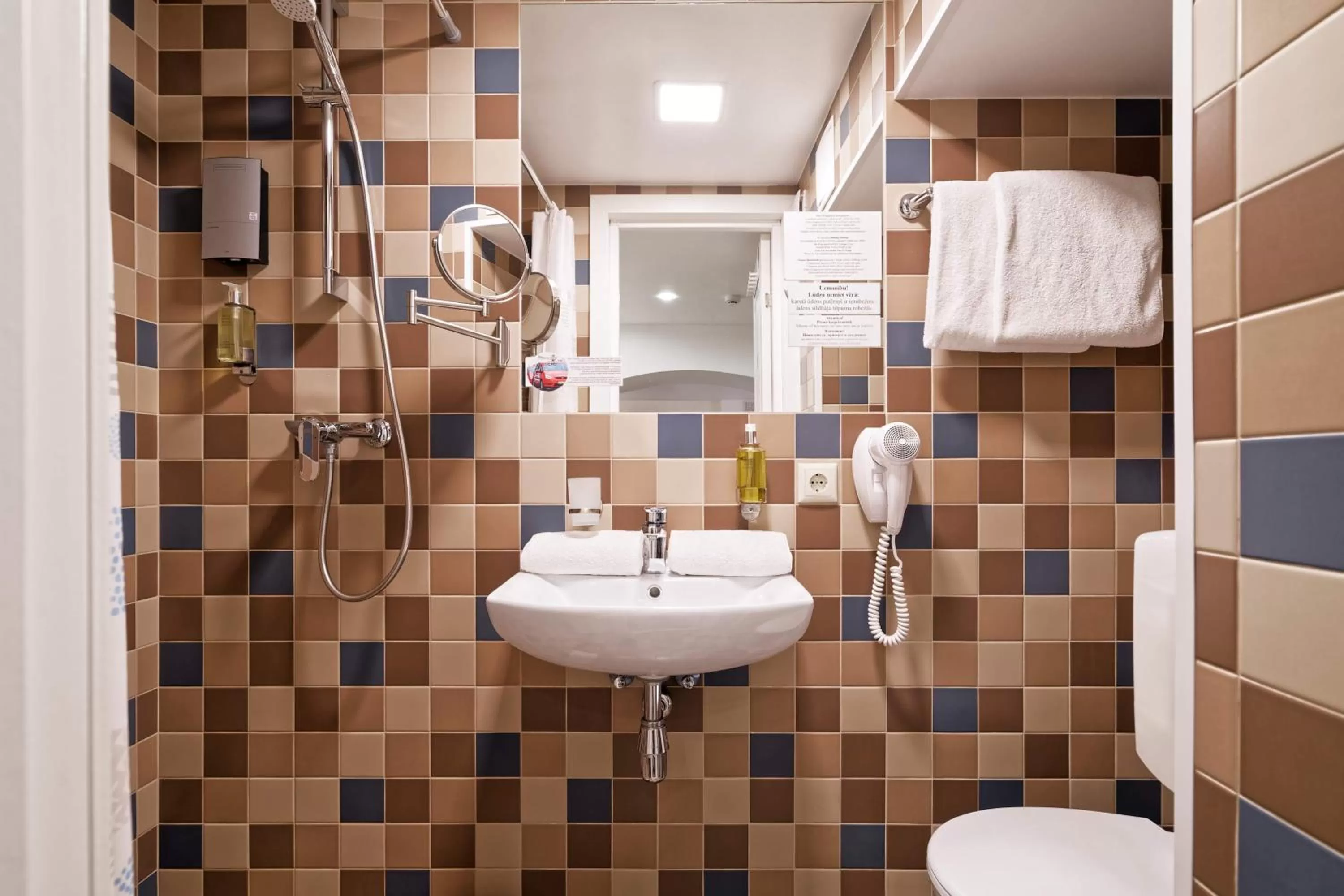 Shower in RIGAAPARTMENT SONADA Self-Service Aparthotel - Private Parking