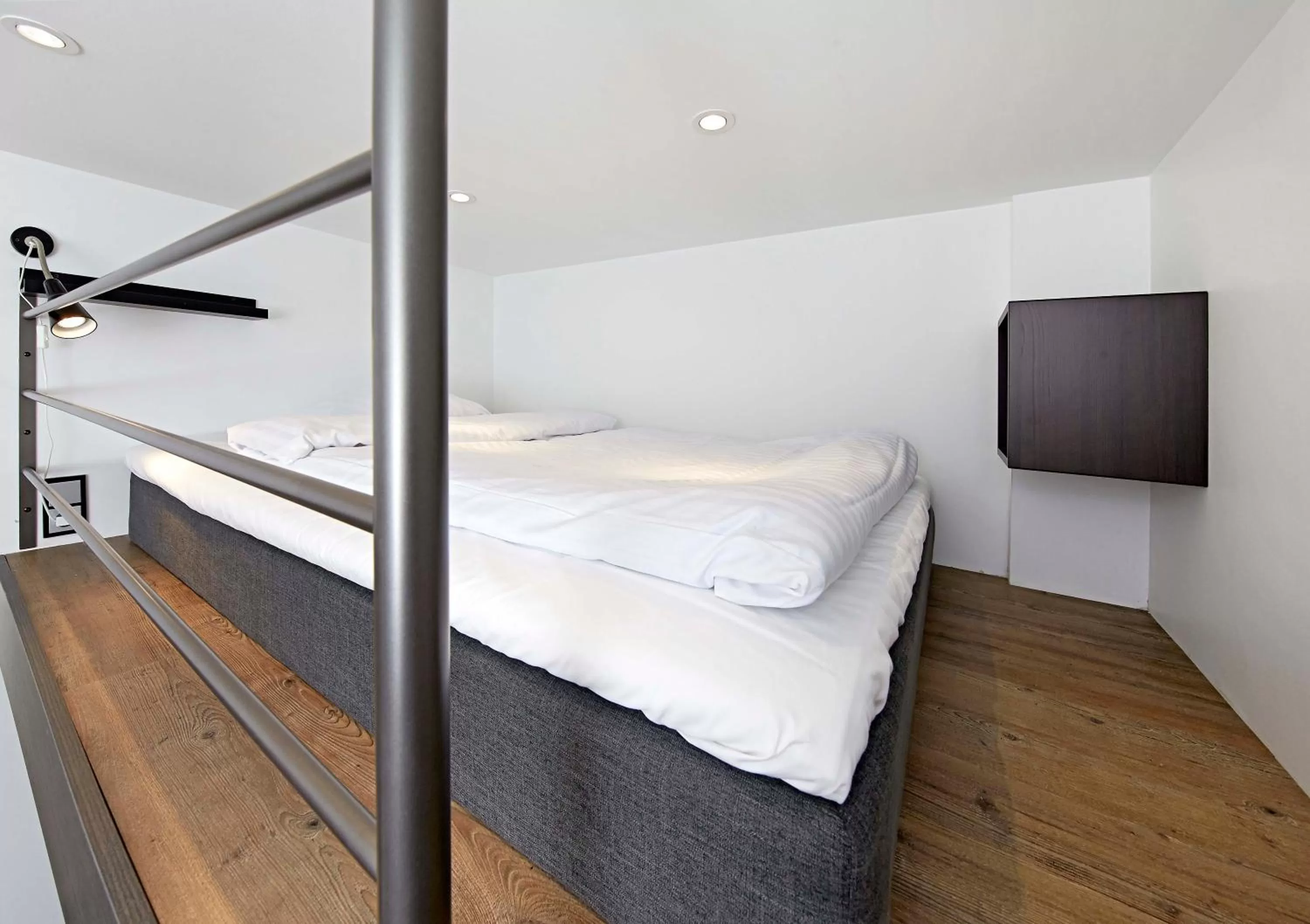 Bed in Living Suites