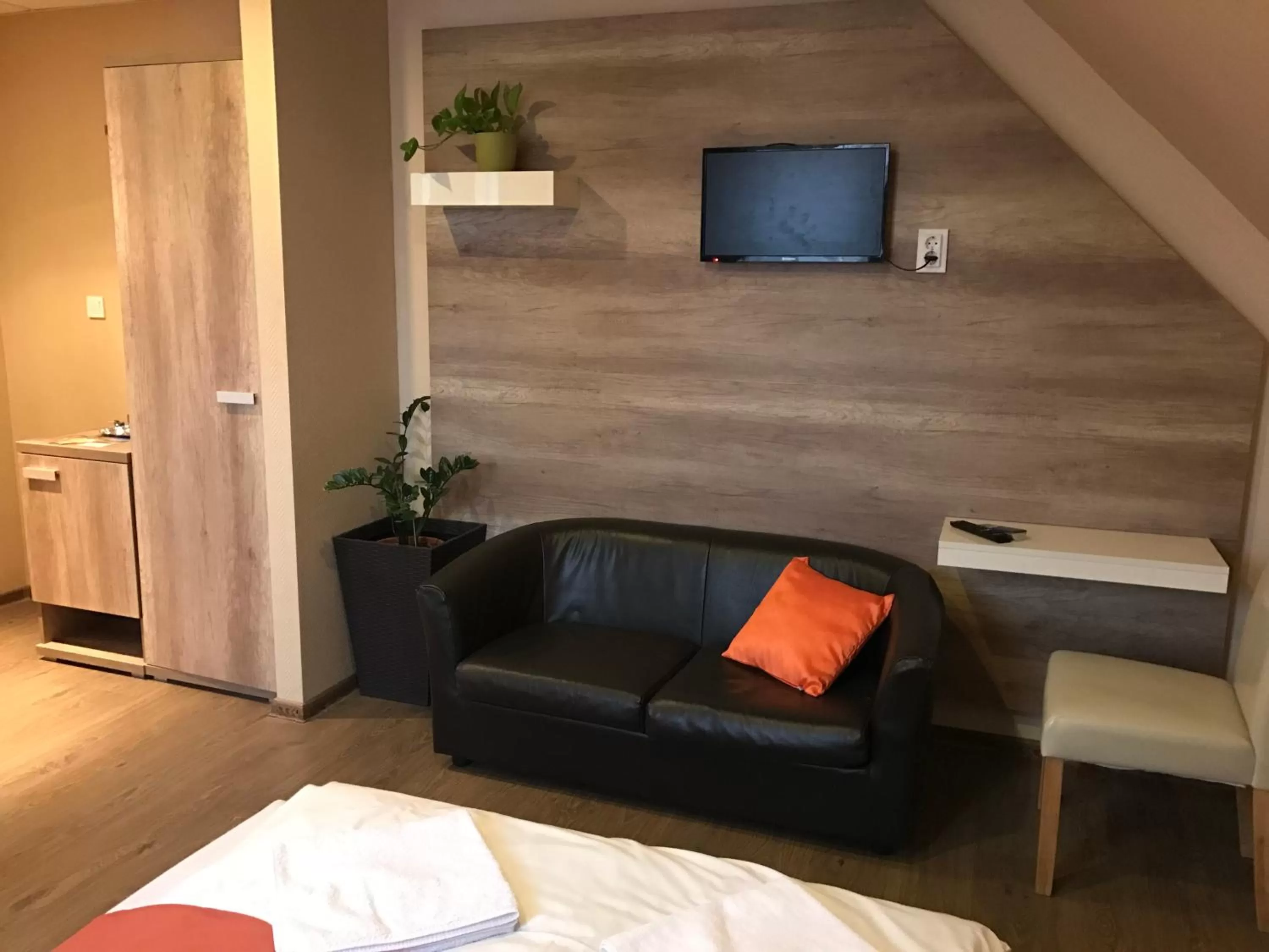 Photo of the whole room, Seating Area in Abszolút Hotel és Panzió