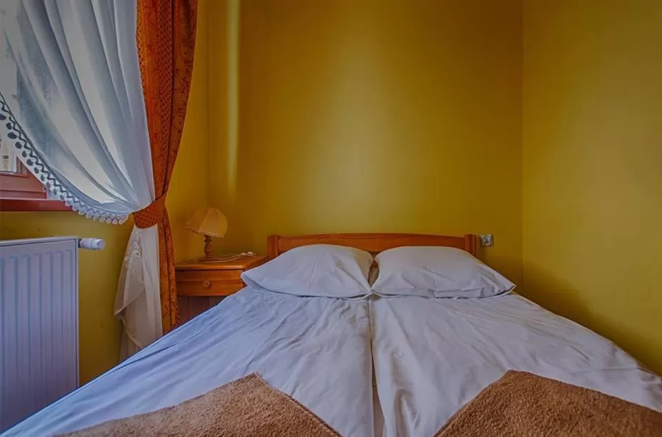Photo of the whole room, Bed in Karczma u Wallenroda