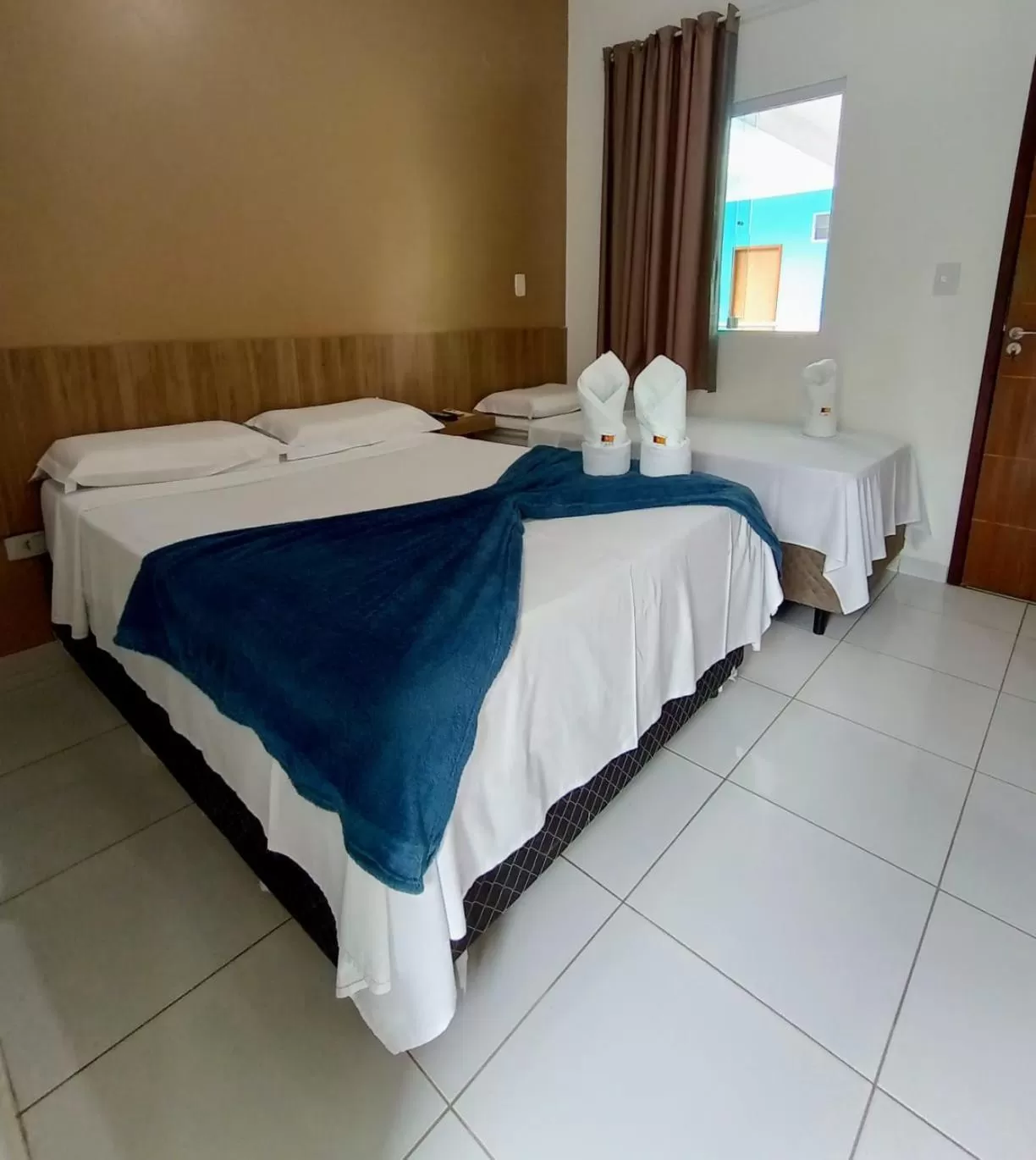 Bed in Pousada Concha Dourada