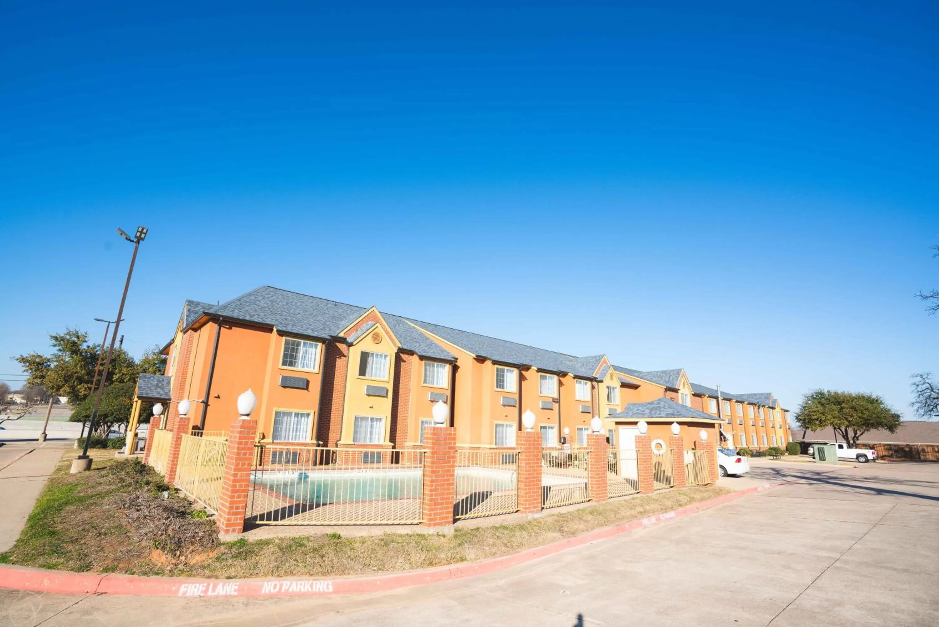 Property building in Regency Inn & Suites DFW