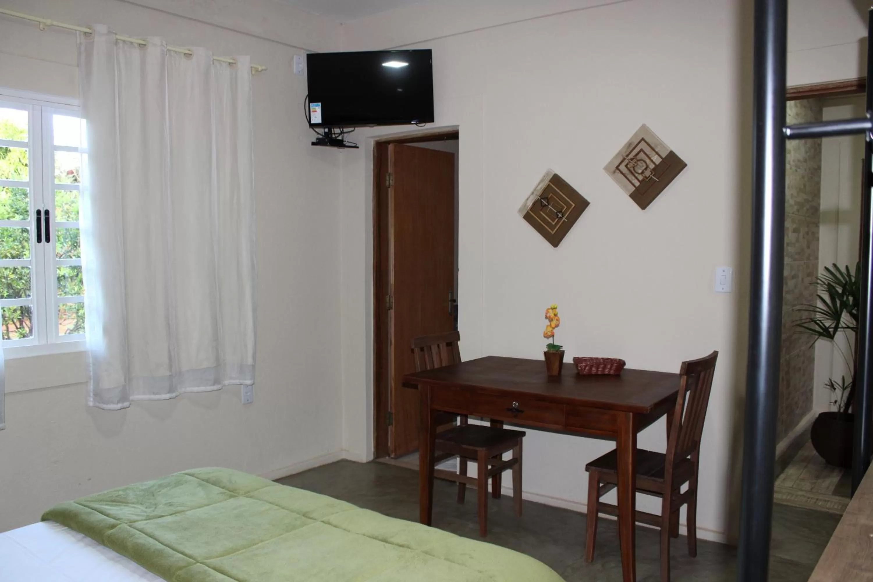 Bed in Pousada Morro dos Ventos