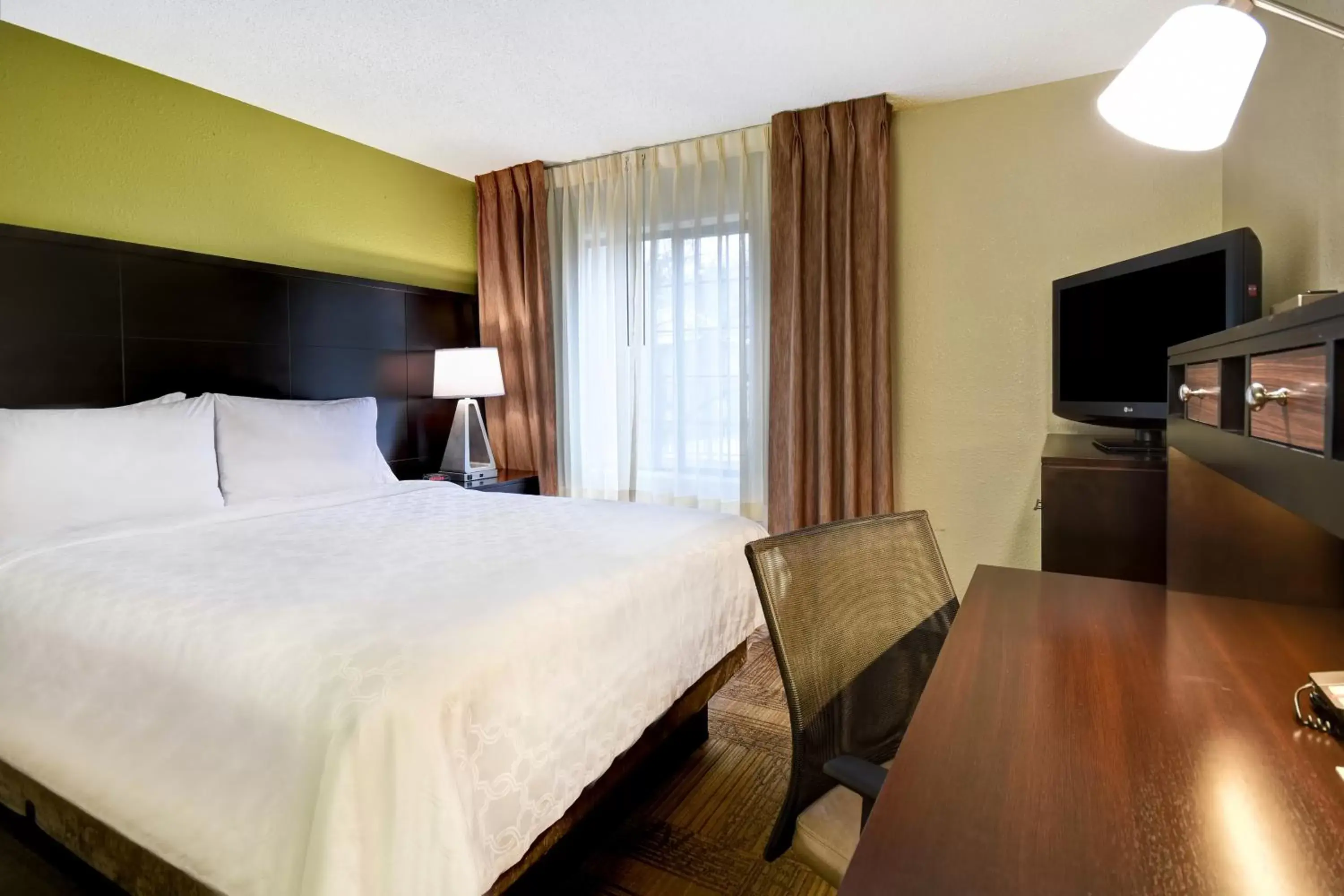 Two-Bedroom Suite with One King and One Queen in Staybridge Suites Grand Rapids-Kentwood, an IHG Hotel Two-Bedroom Suite with One King and One Queen in Staybridge Suites Grand Rapids-Kentwood, an IHG Hotel