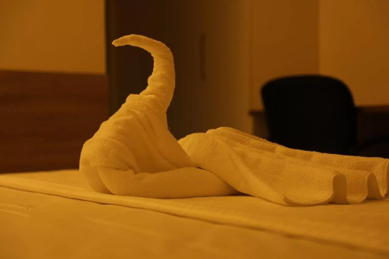 Bed in SwanSuites Gachibowli